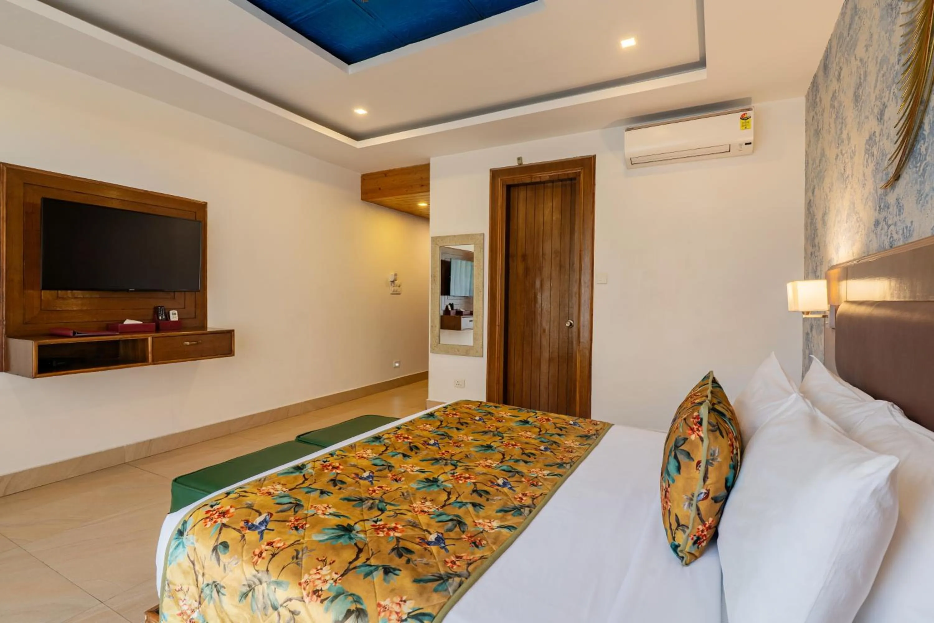 Bedroom, Bed in Summit By The Ganges Beach Resort & Spa