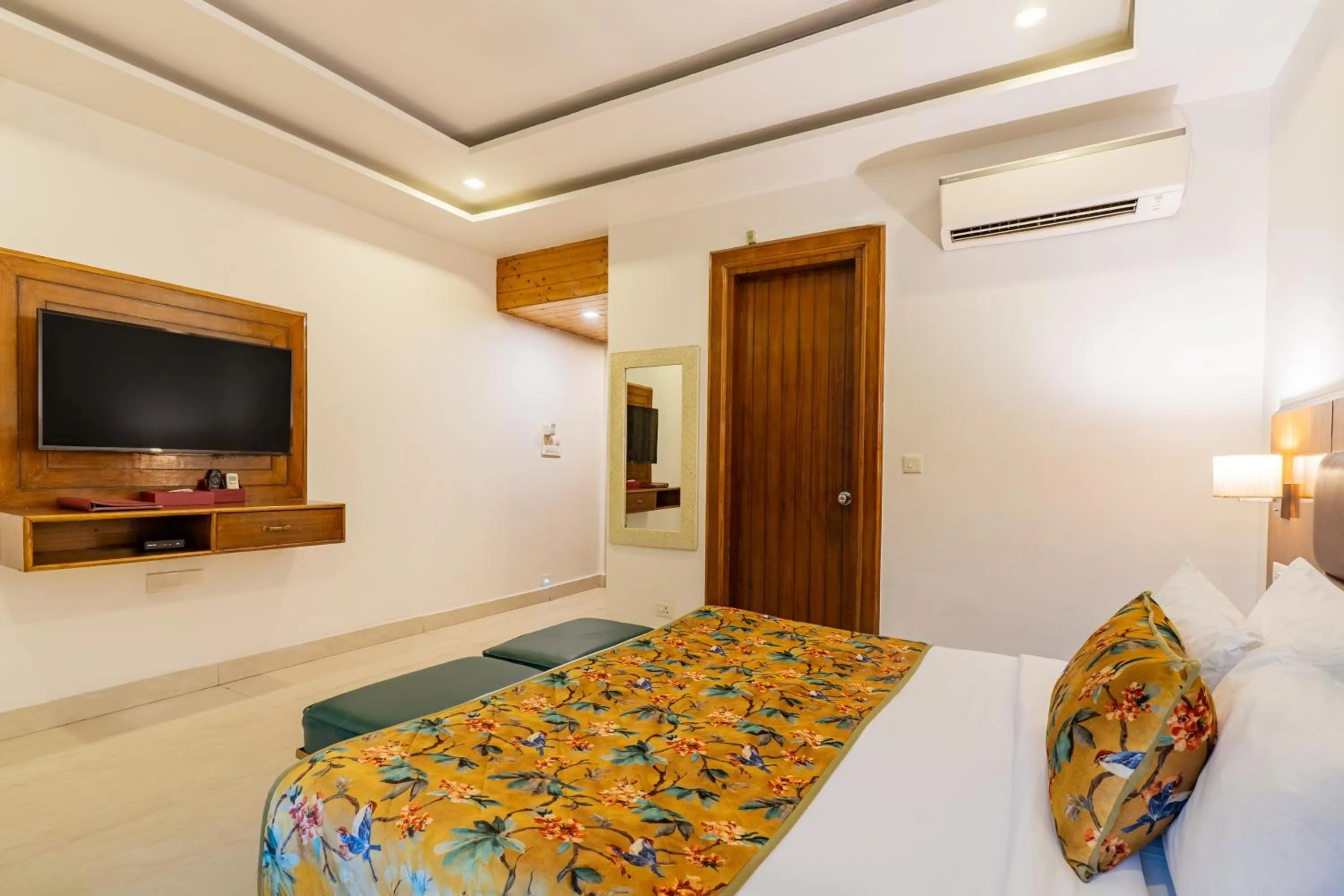 Bedroom, Bed in Summit By The Ganges Beach Resort & Spa