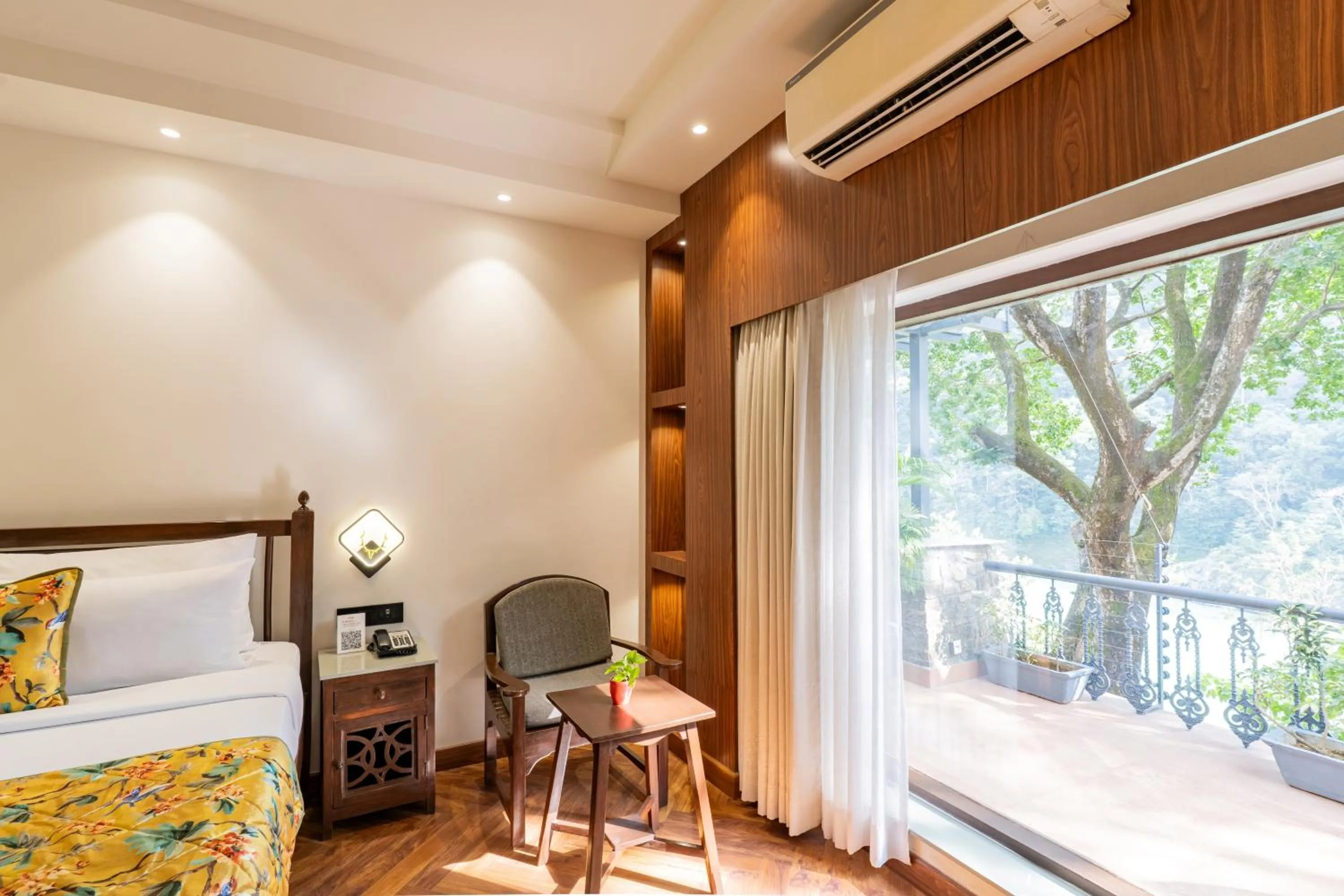 Bedroom, Bed in Summit By The Ganges Beach Resort & Spa