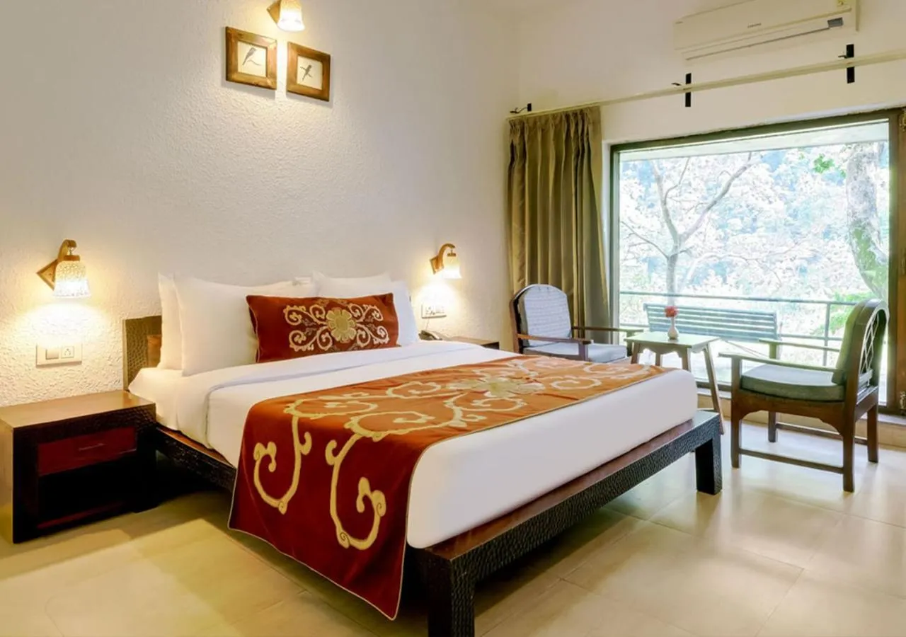 Bed in Summit By The Ganges Beach Resort & Spa
