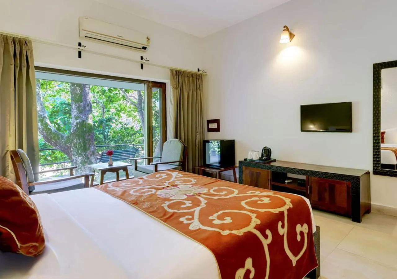 Bed in Summit By The Ganges Beach Resort & Spa