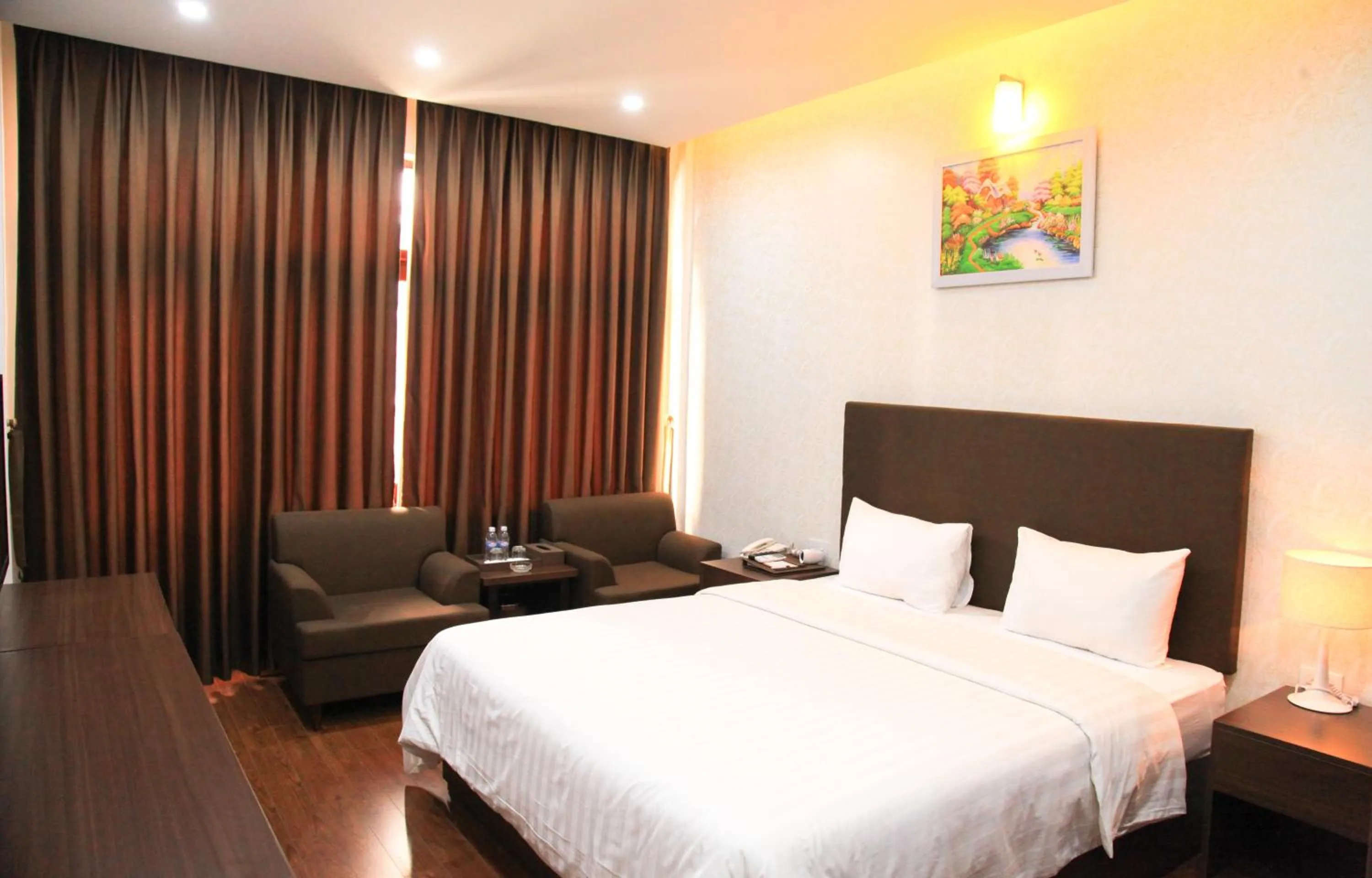 Bed in Bình Minh Hotel