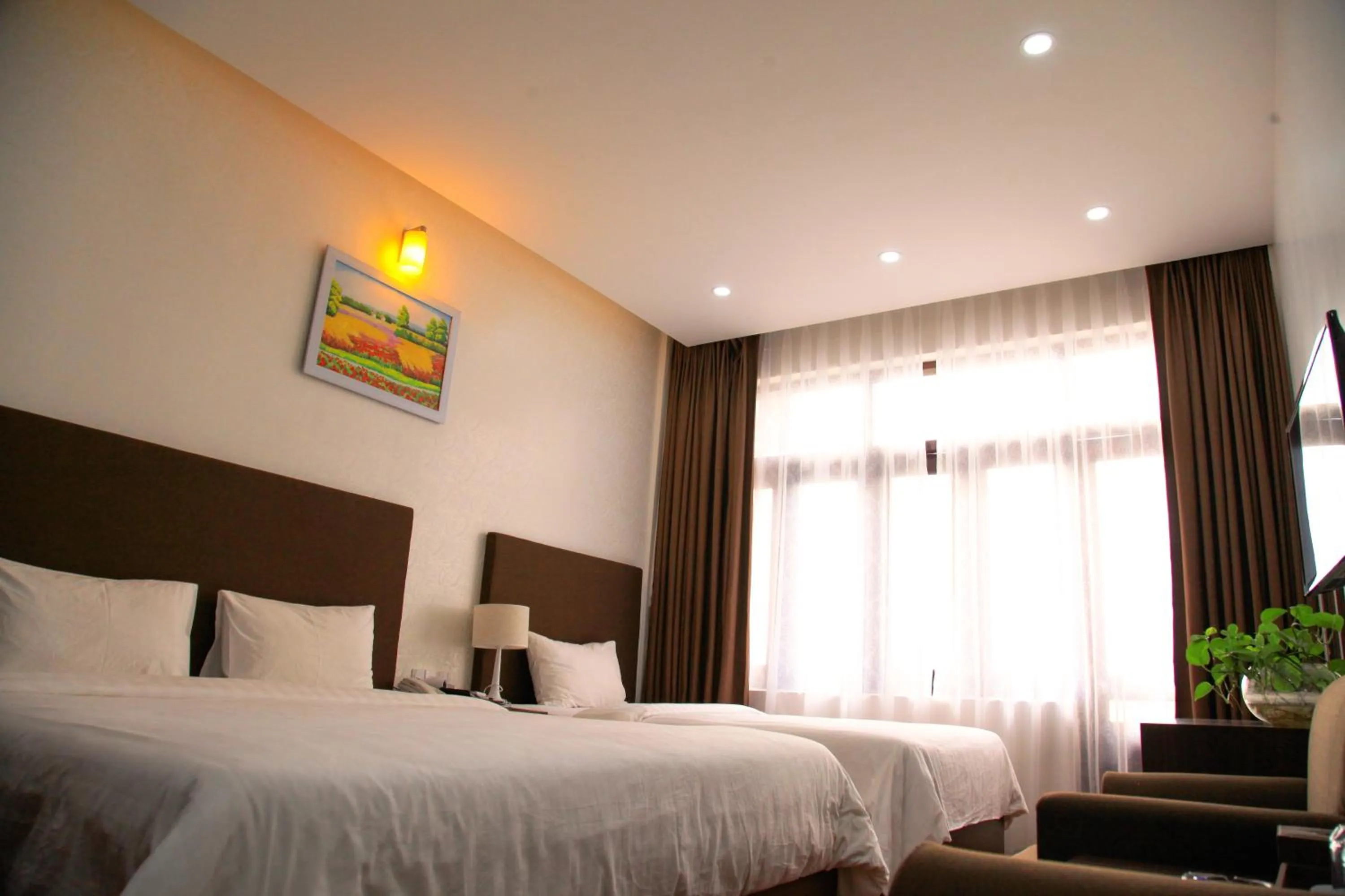 Bed in Bình Minh Hotel