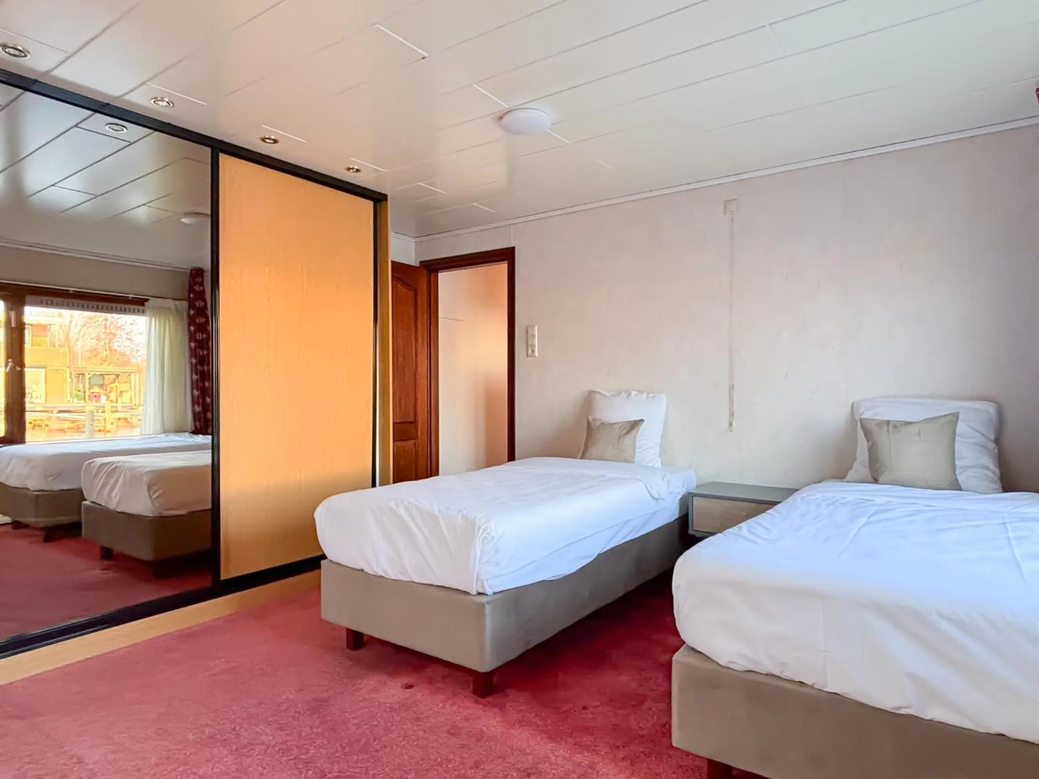 Bed in VISSERSLUST Rooms, Apartments and Houseboats