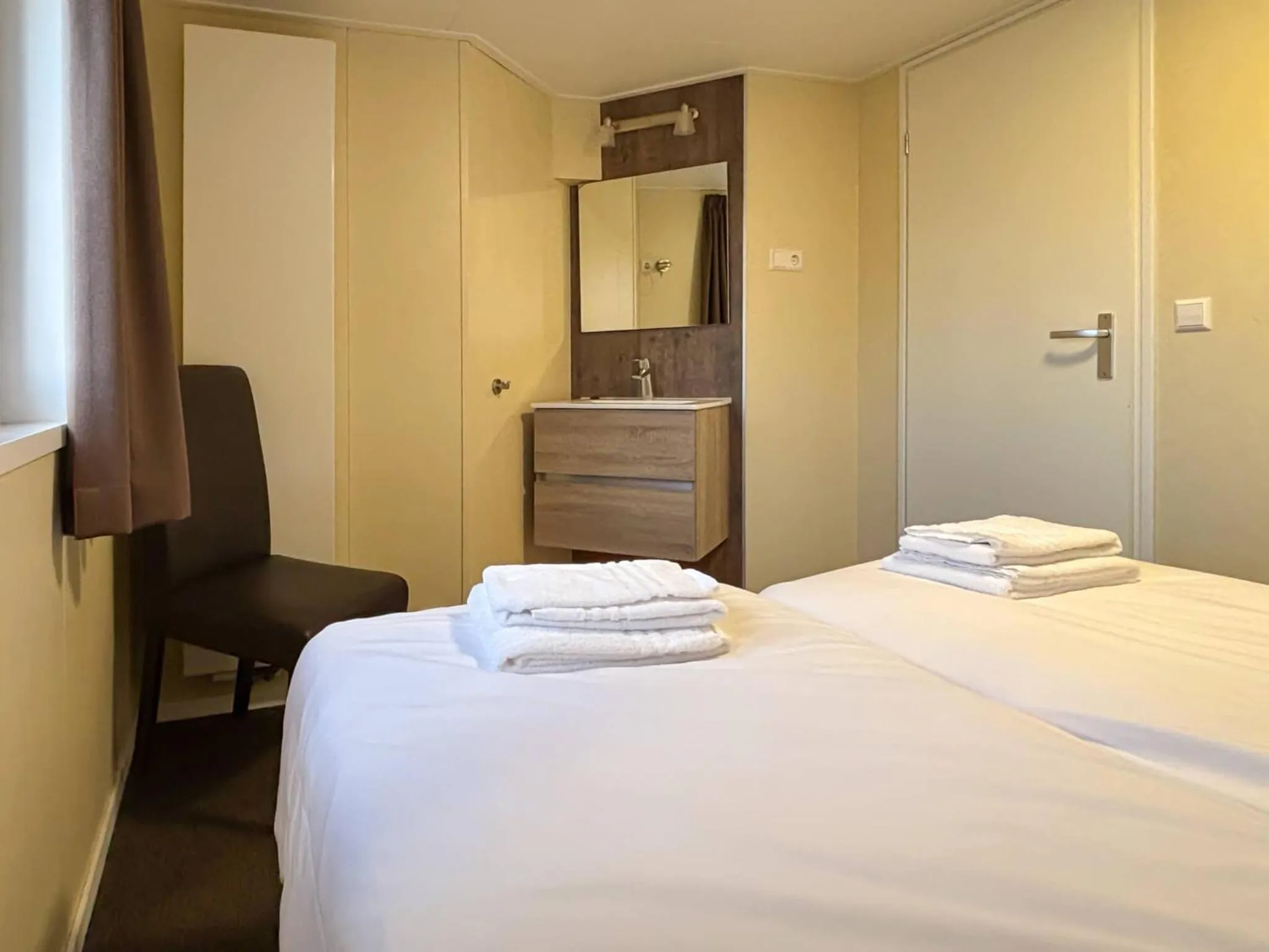 Bed in VISSERSLUST Rooms, Apartments and Houseboats