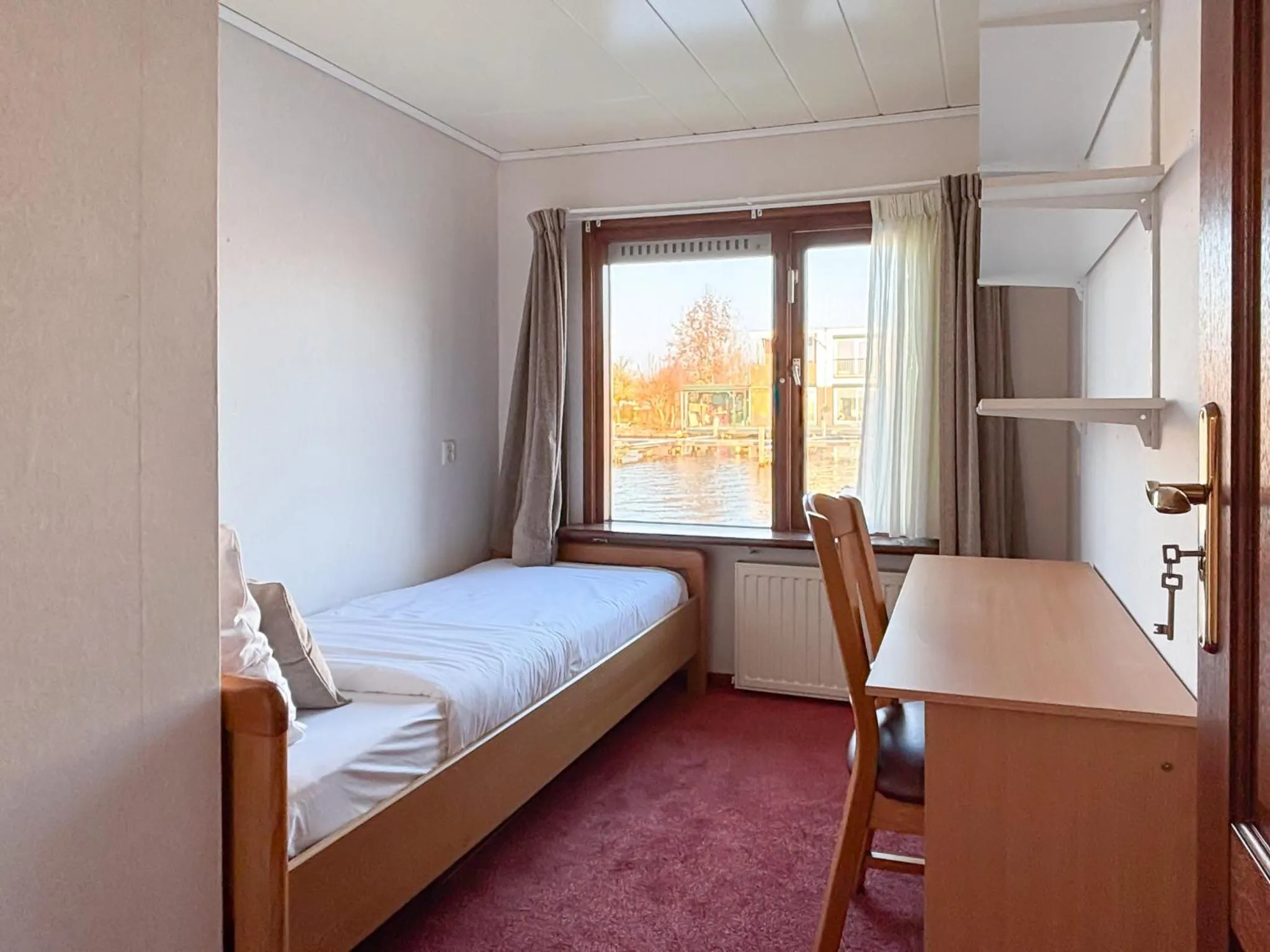 Bed in VISSERSLUST Rooms, Apartments and Houseboats