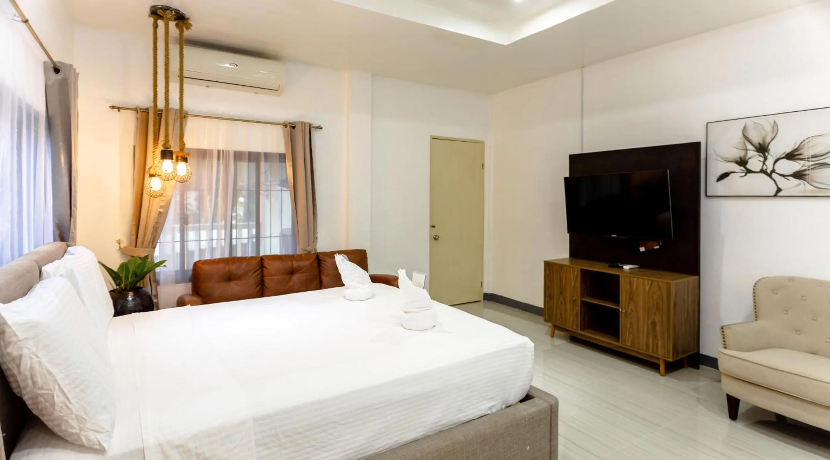 Bed in MADISON GARDEN AND RESIDENCES