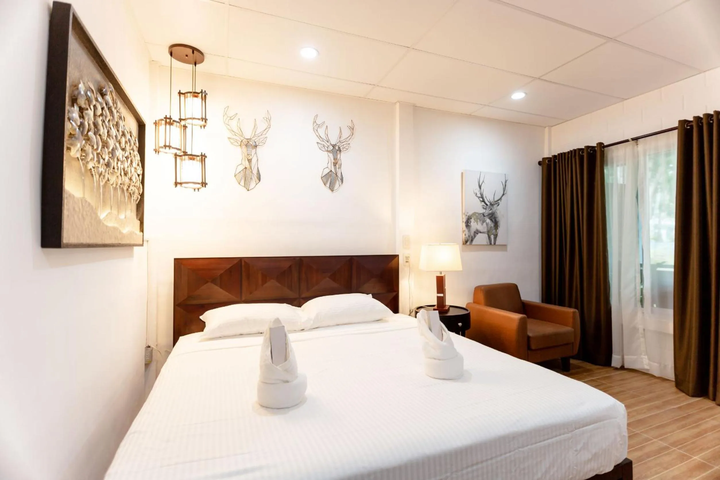 Bed in MADISON GARDEN AND RESIDENCES