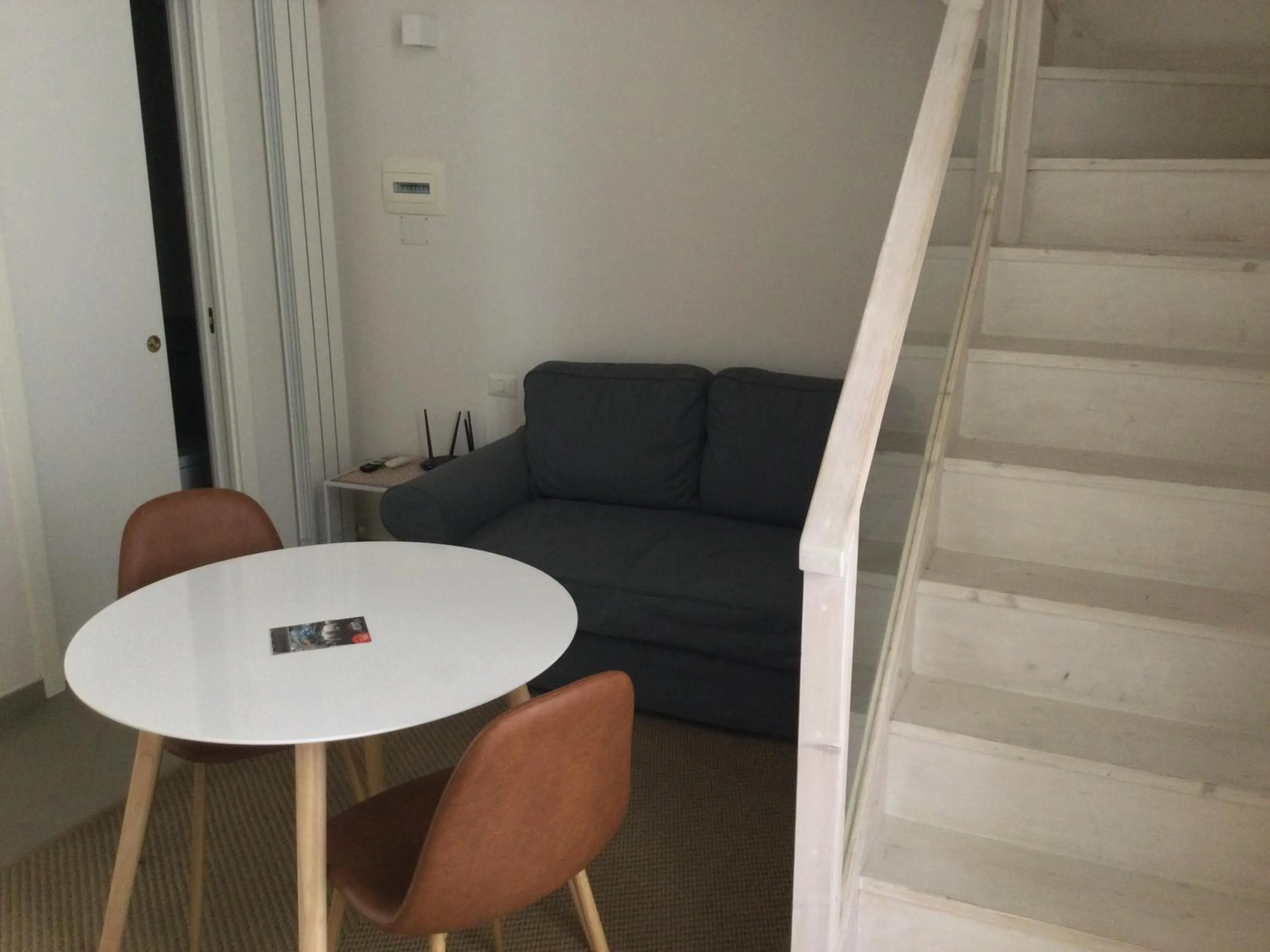 Living room in Piano Nobile by Napoliapartments