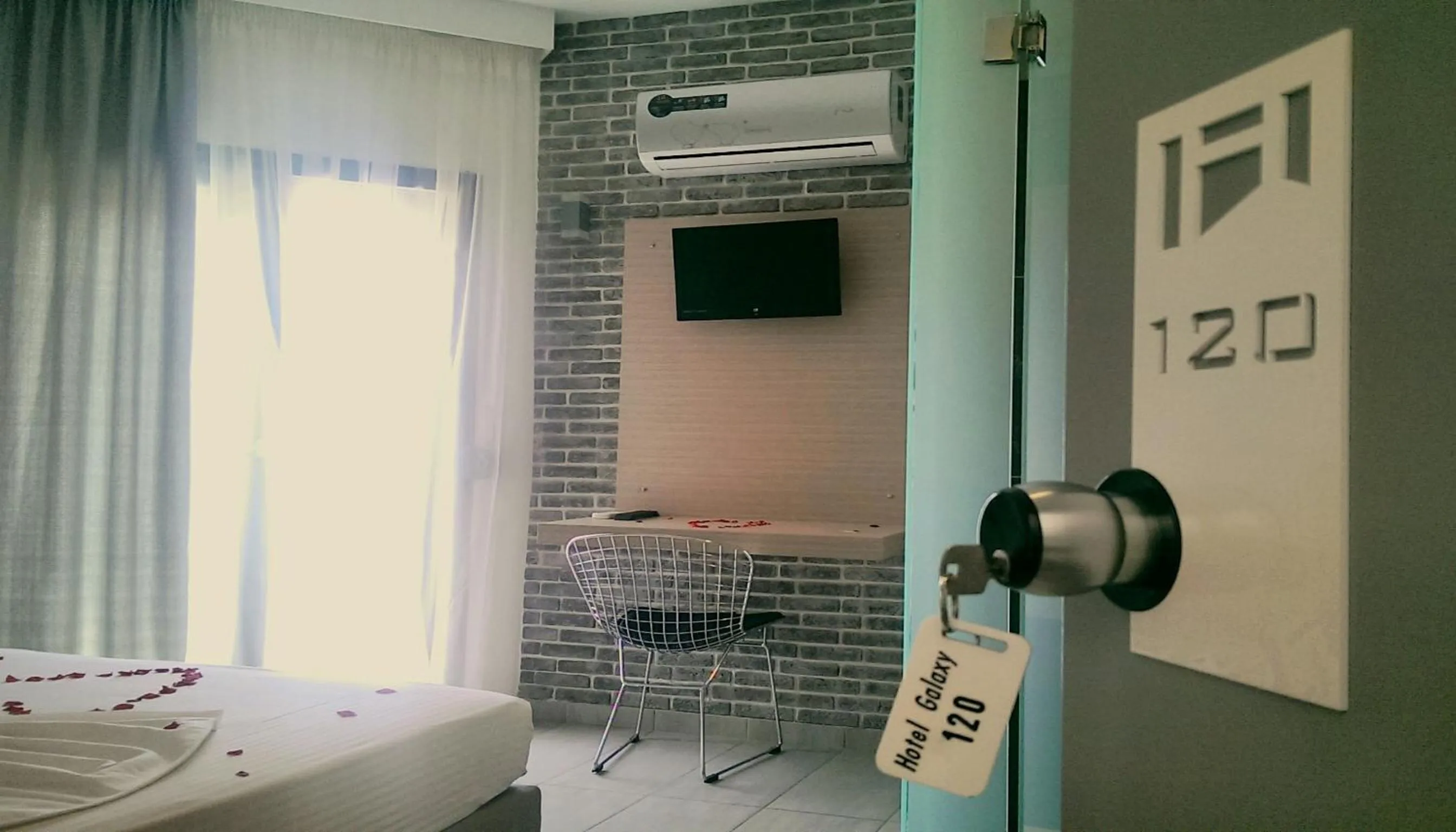 Bedroom in Galaxy City Hotel