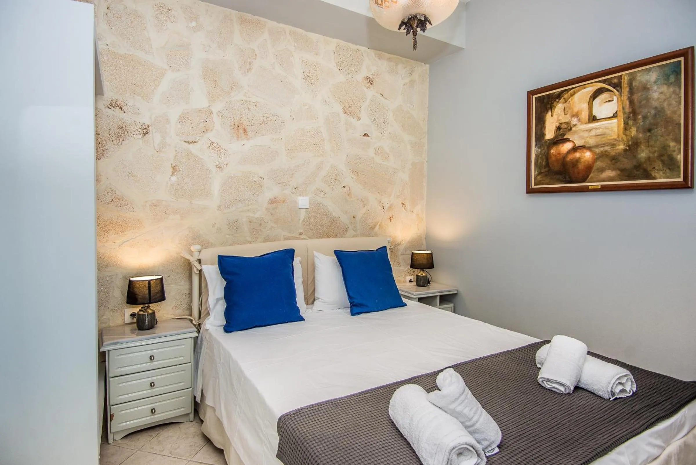 Bed in Xenia Ionis luxury apartments