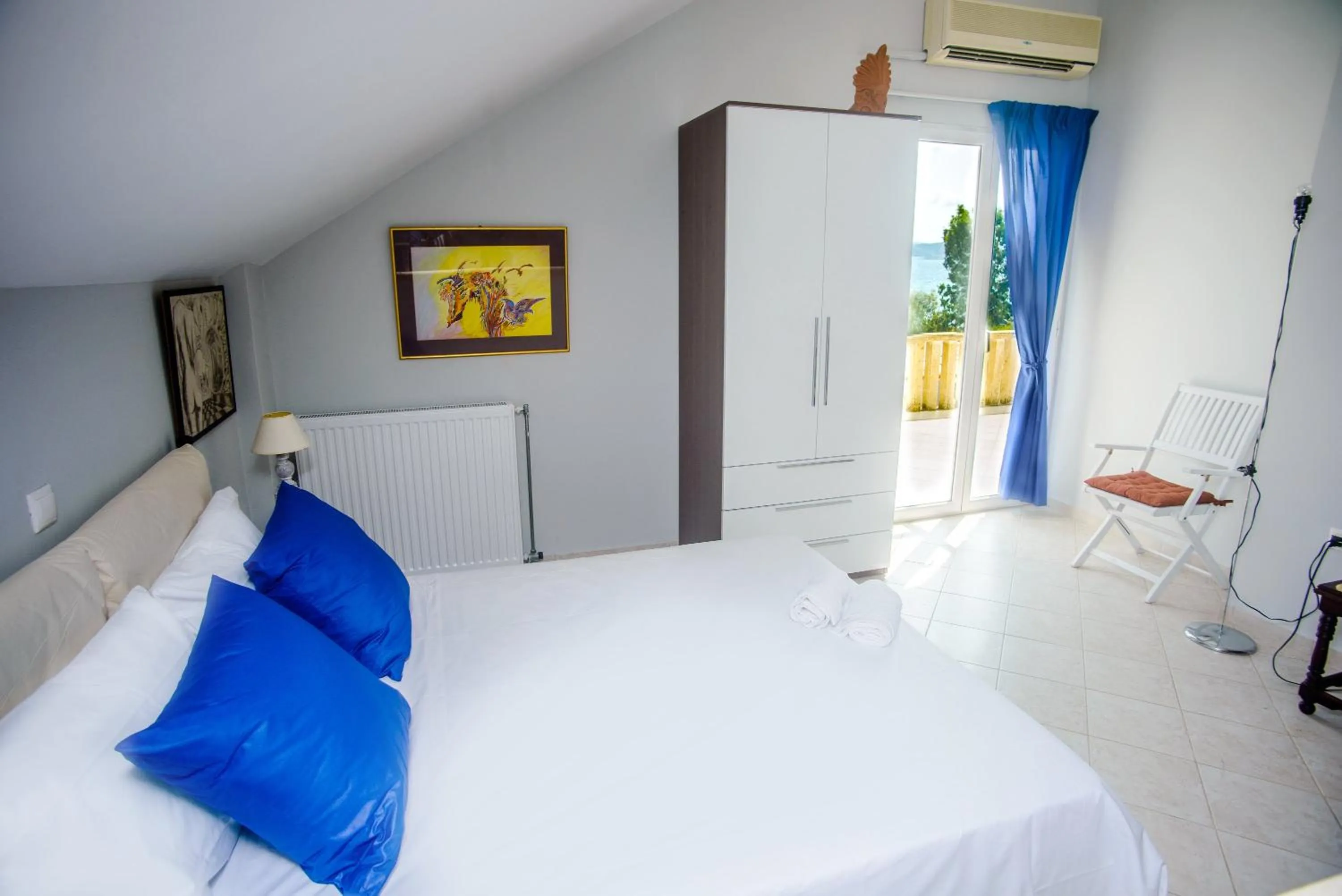 Bed in Xenia Ionis luxury apartments