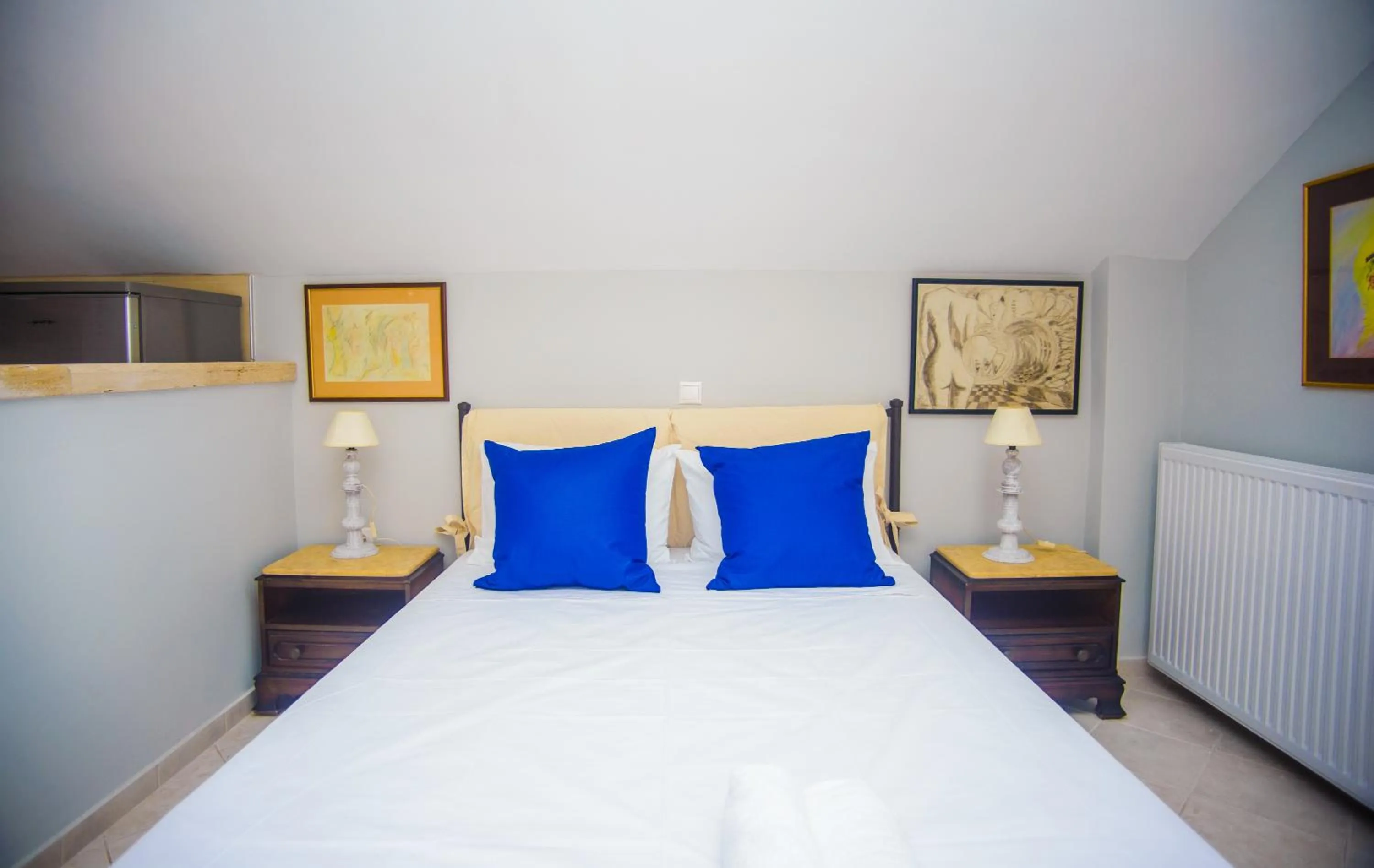 Bed in Xenia Ionis luxury apartments