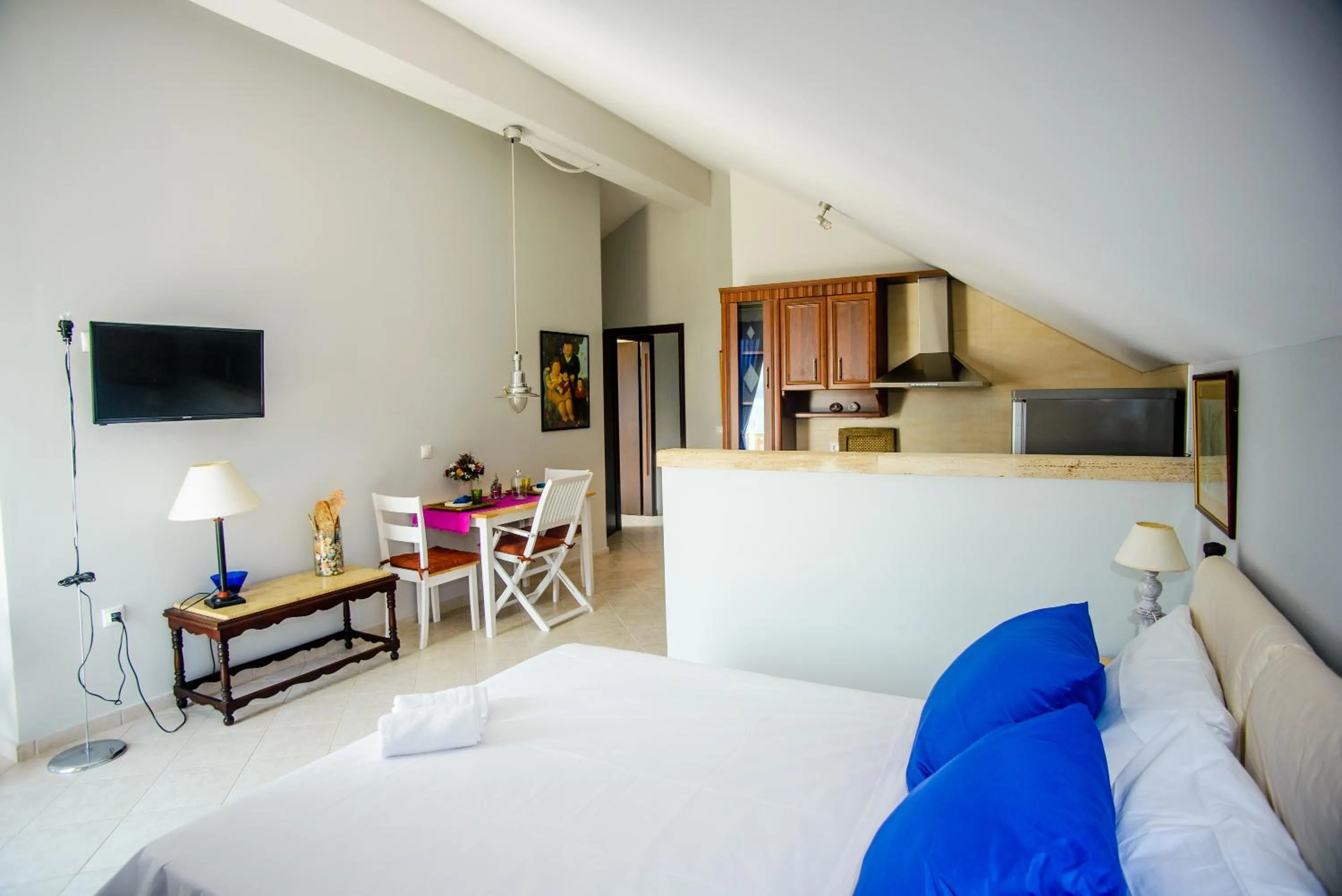 Bed in Xenia Ionis luxury apartments