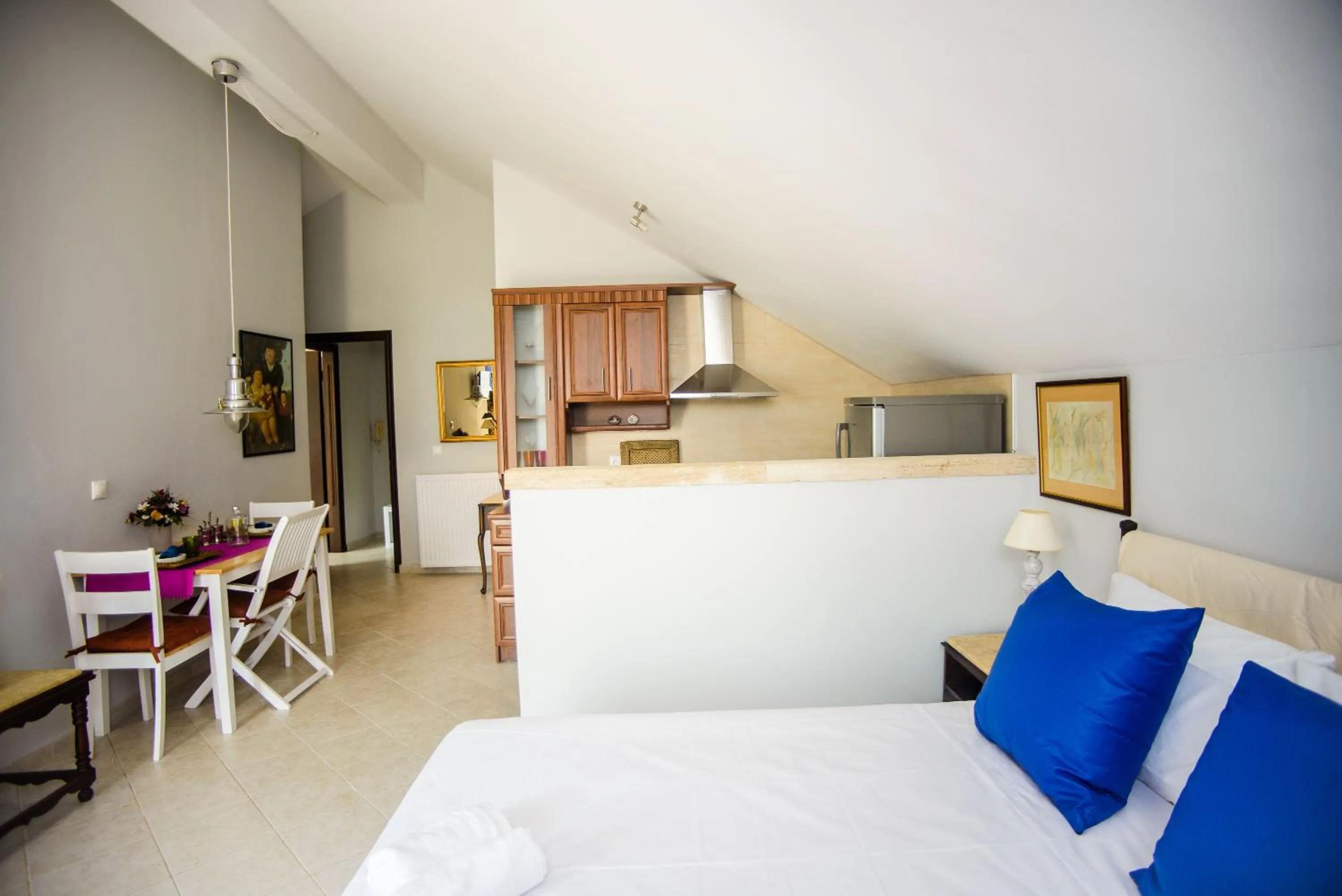 Bed in Xenia Ionis luxury apartments