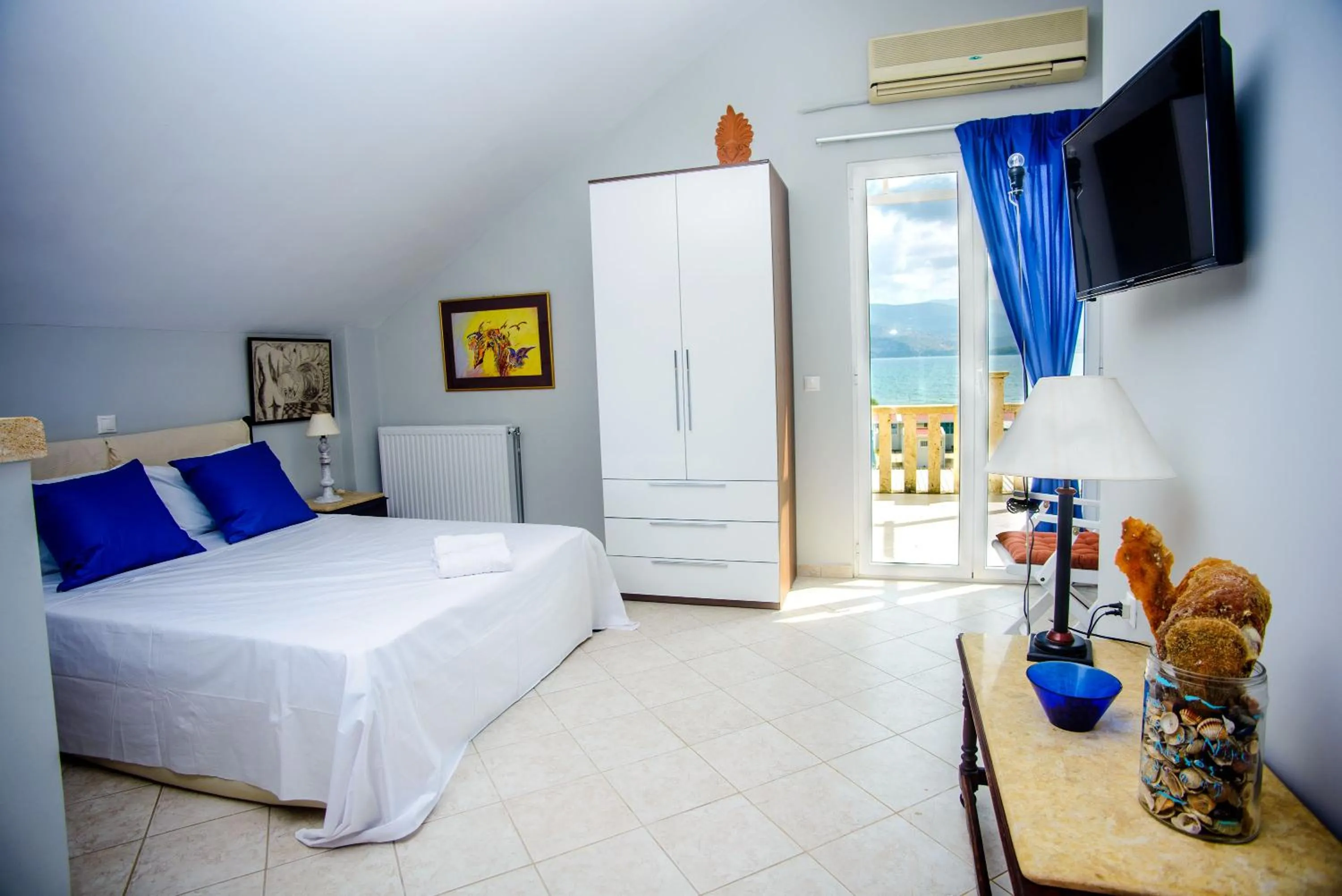 Bed in Xenia Ionis luxury apartments