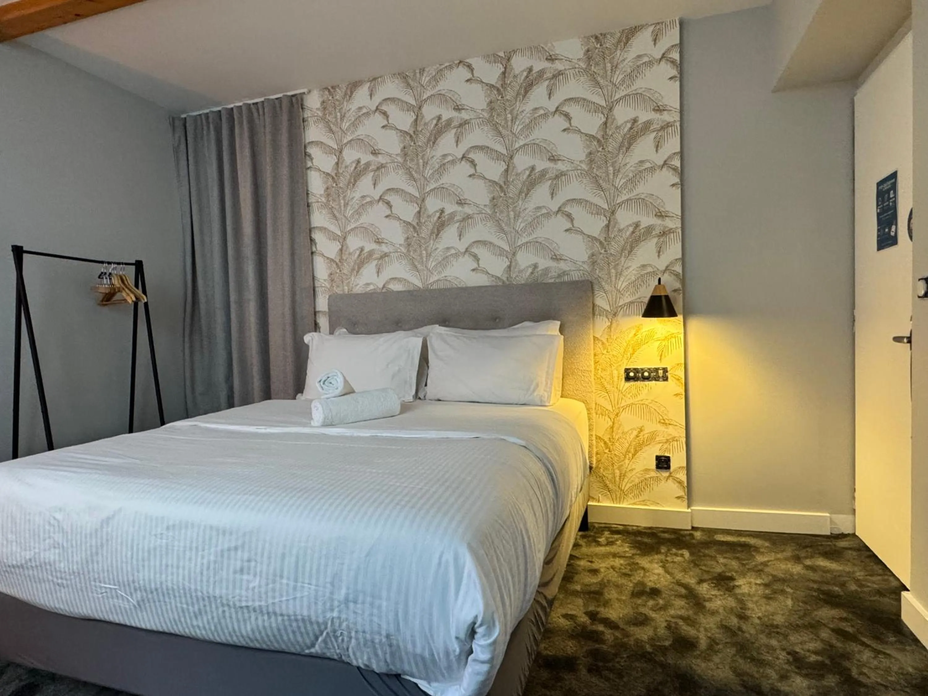 Bed in Hôtel Une Chambre en Ville