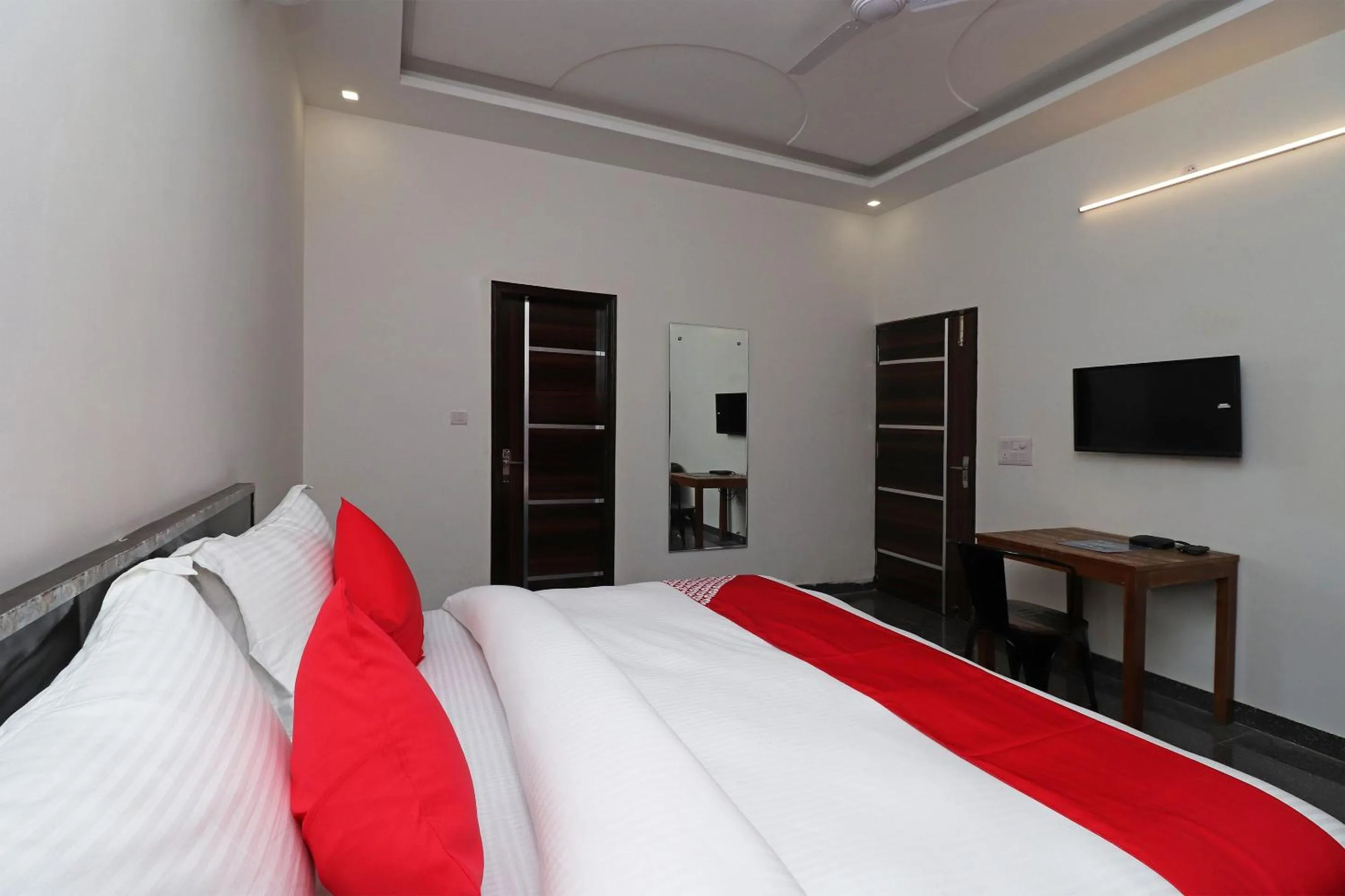 Bedroom in Hotel O Laxmi Residency