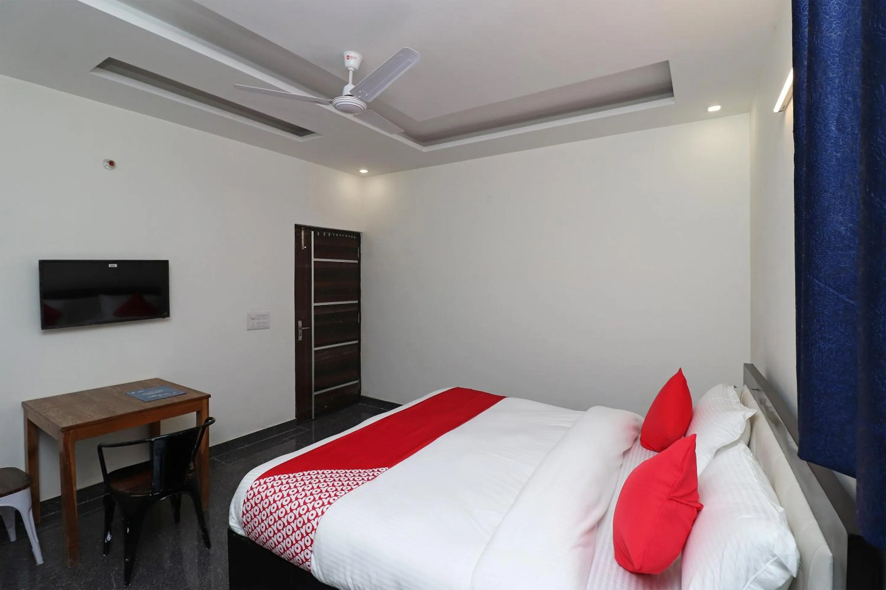 Bedroom in Hotel O Laxmi Residency