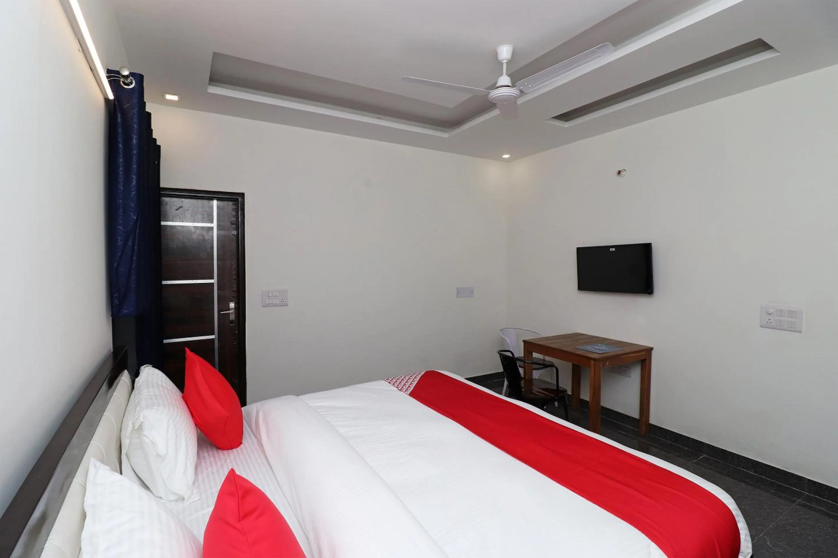 Bedroom in Hotel O Laxmi Residency