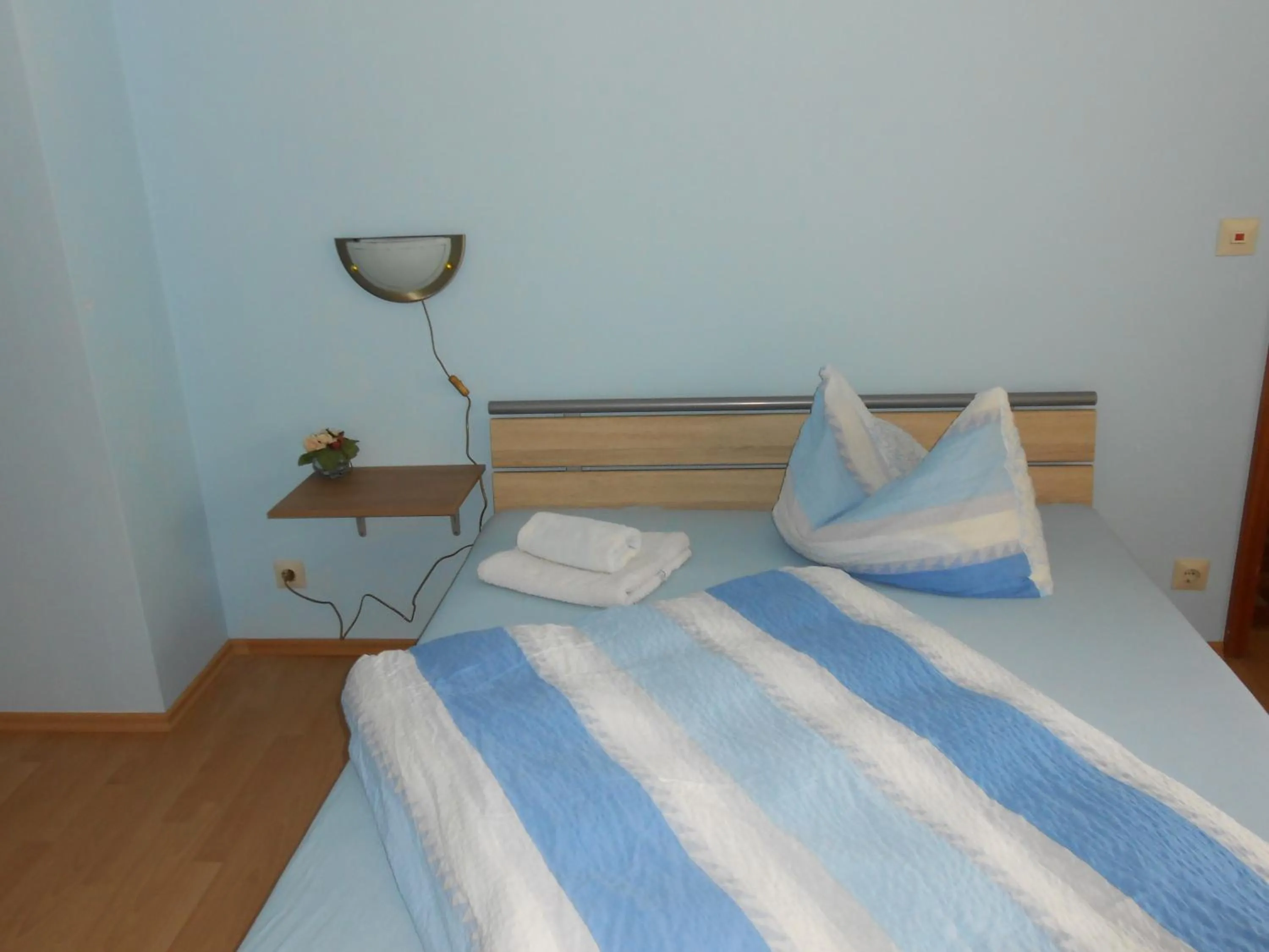 Bed in Pension Weinhaus Unger