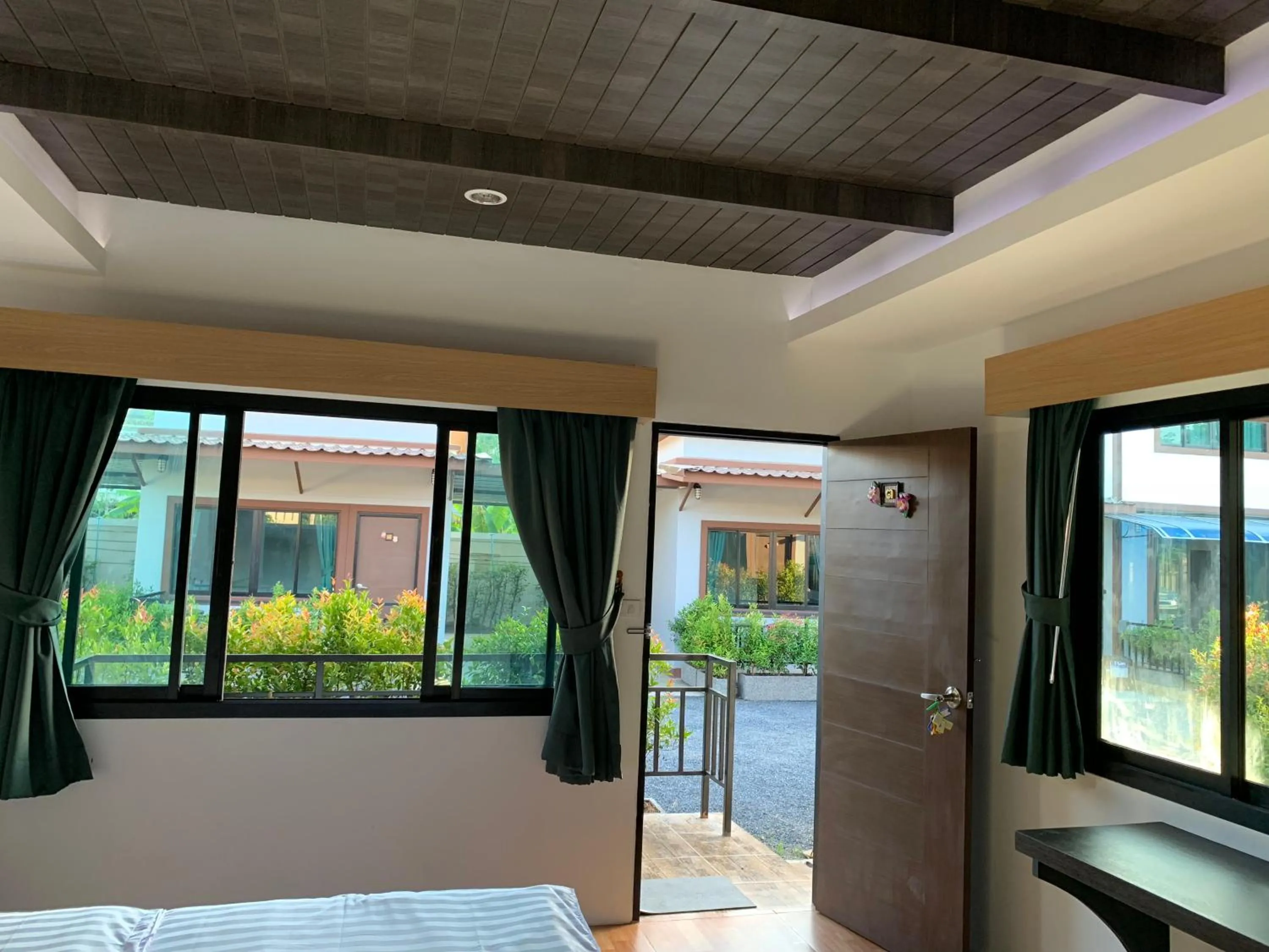 Garden view, Bed in Thalang resort