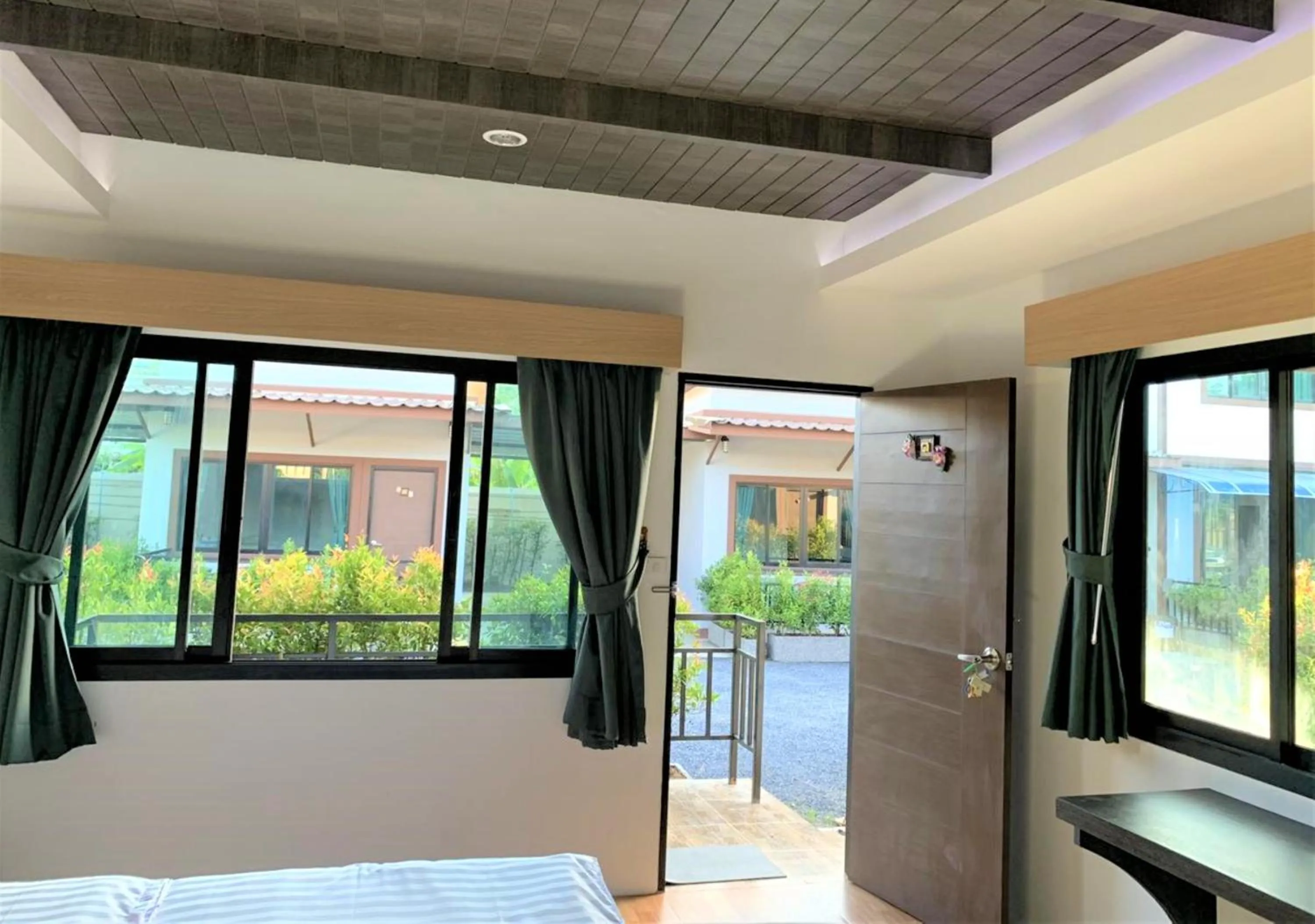 Garden view, Bed in Thalang resort