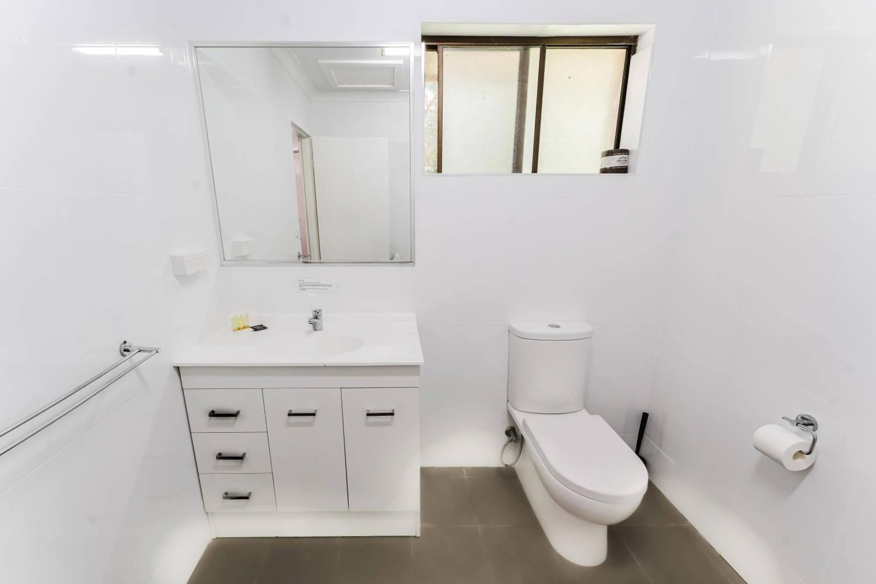 Toilet in Country 2 Coast Motor Inn Coffs Harbour