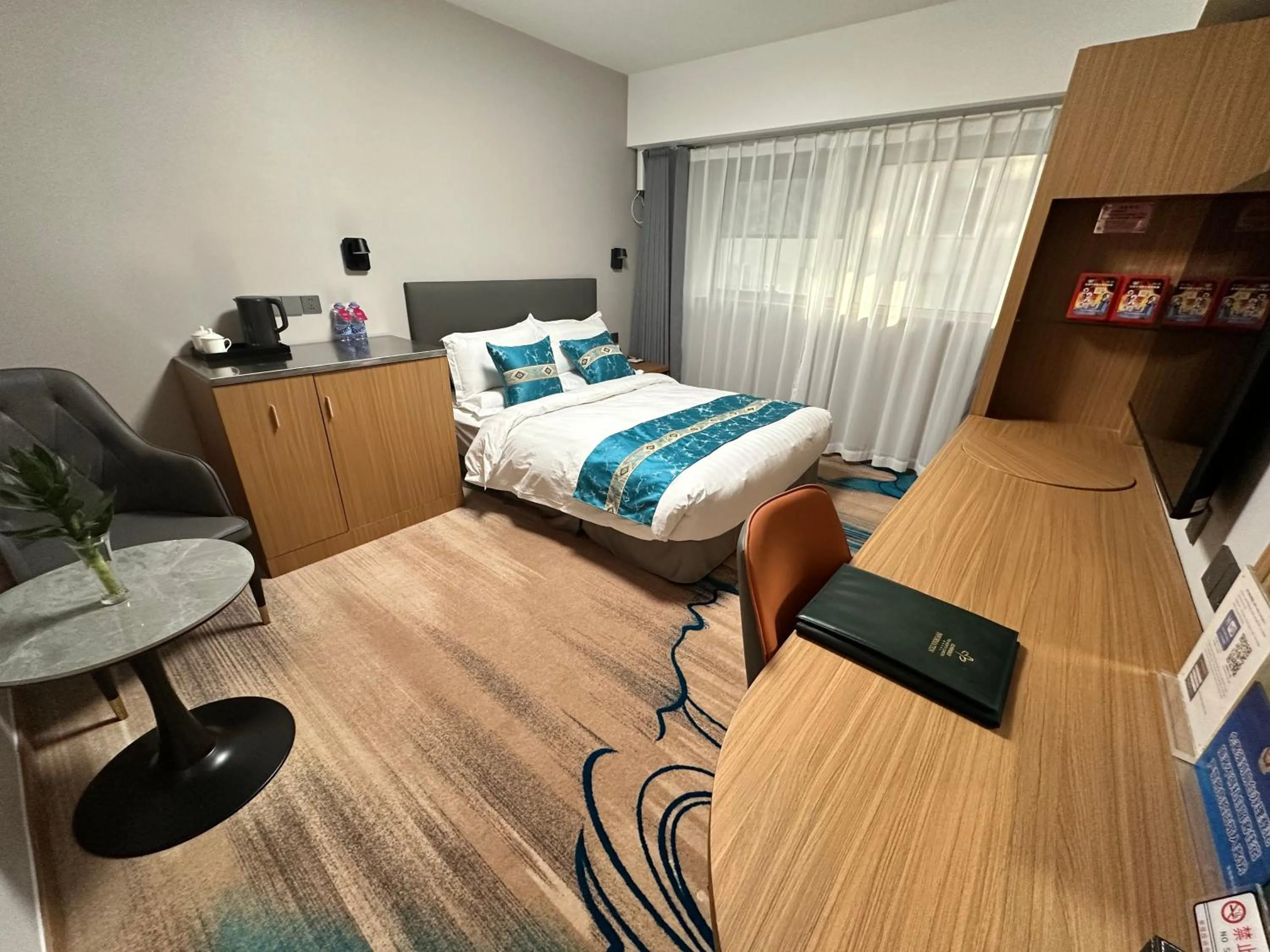 Bed in The North Garden Hotel Beijing Wangfujing