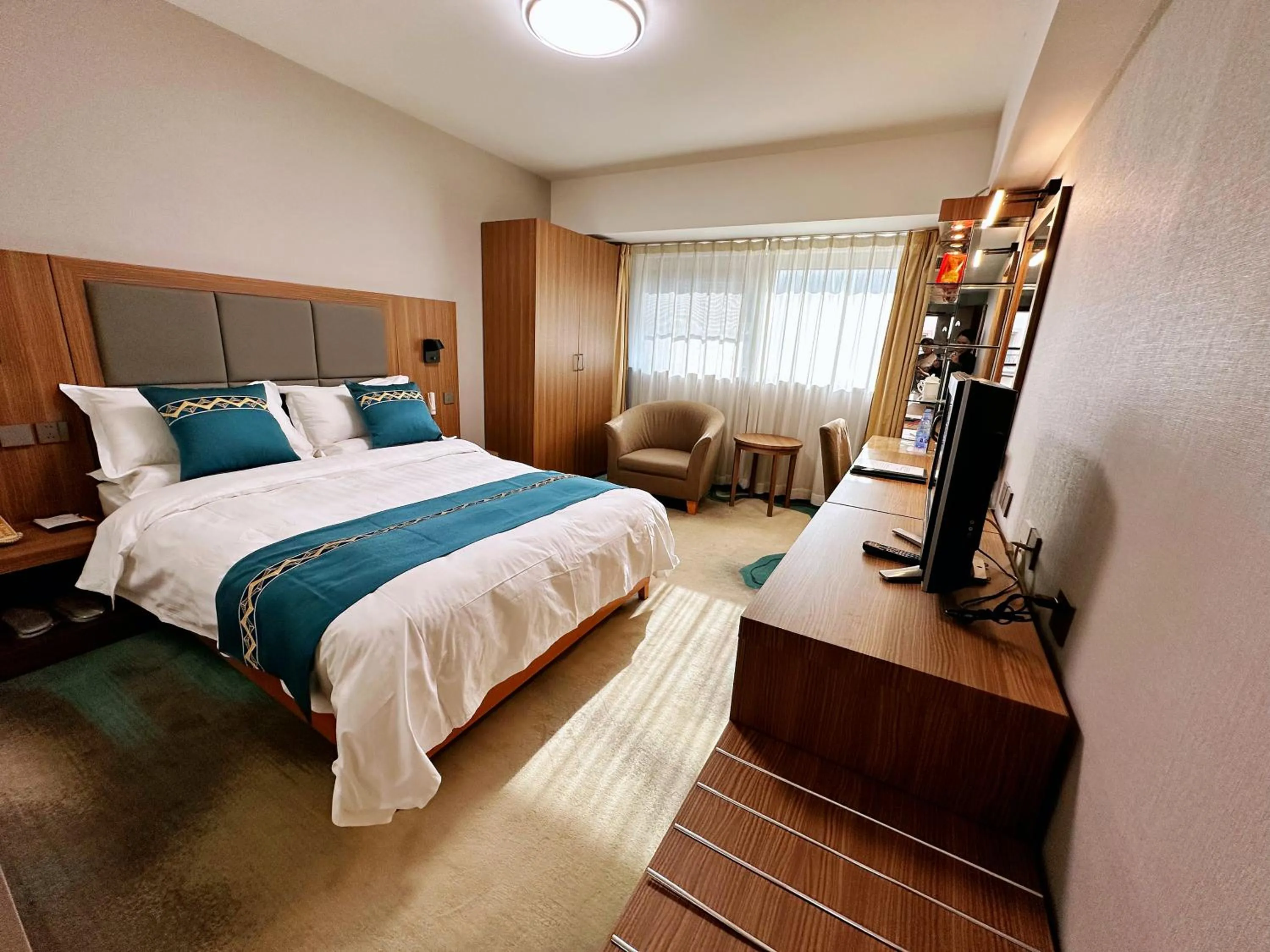 Bed in The North Garden Hotel Beijing Wangfujing