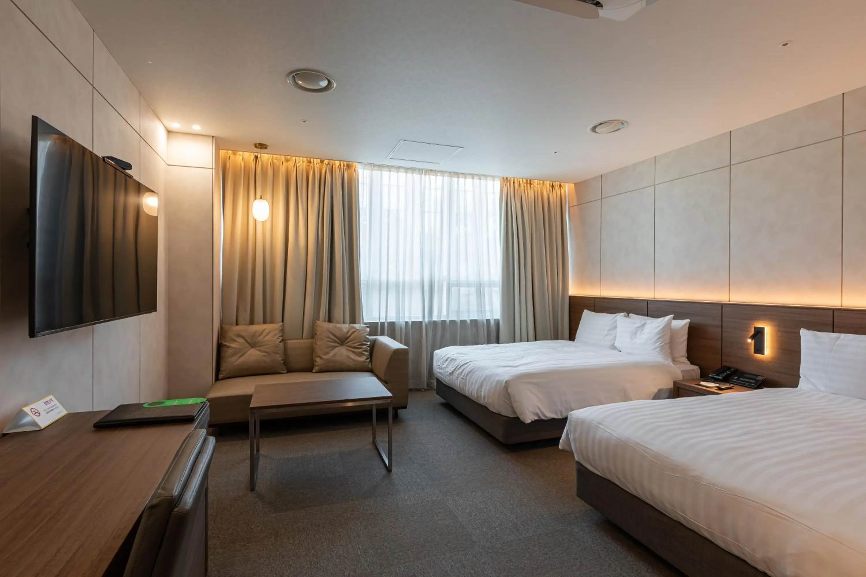 Bed in New Seoul Hotel Myeongdong