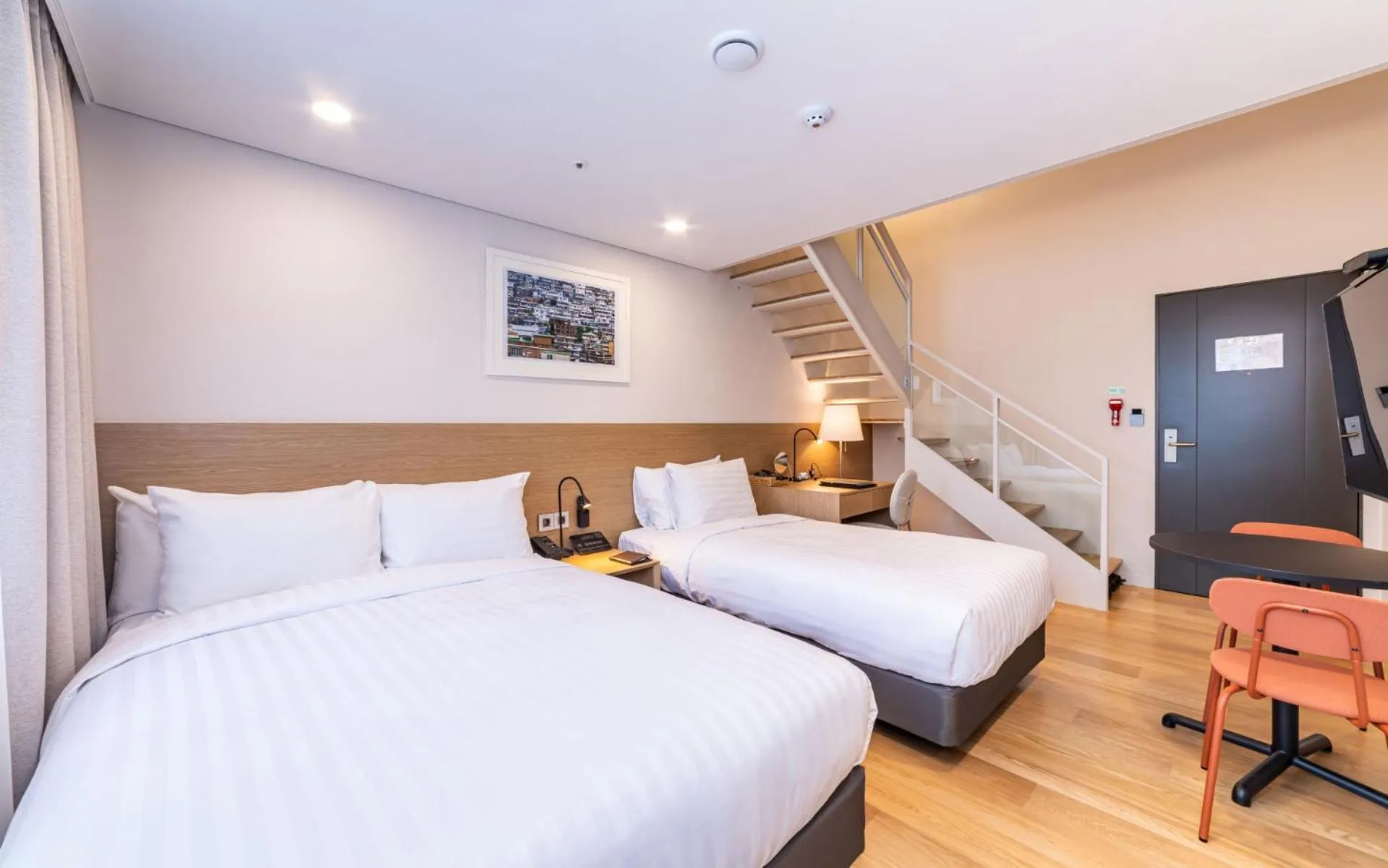 Bed in New Seoul Hotel Myeongdong