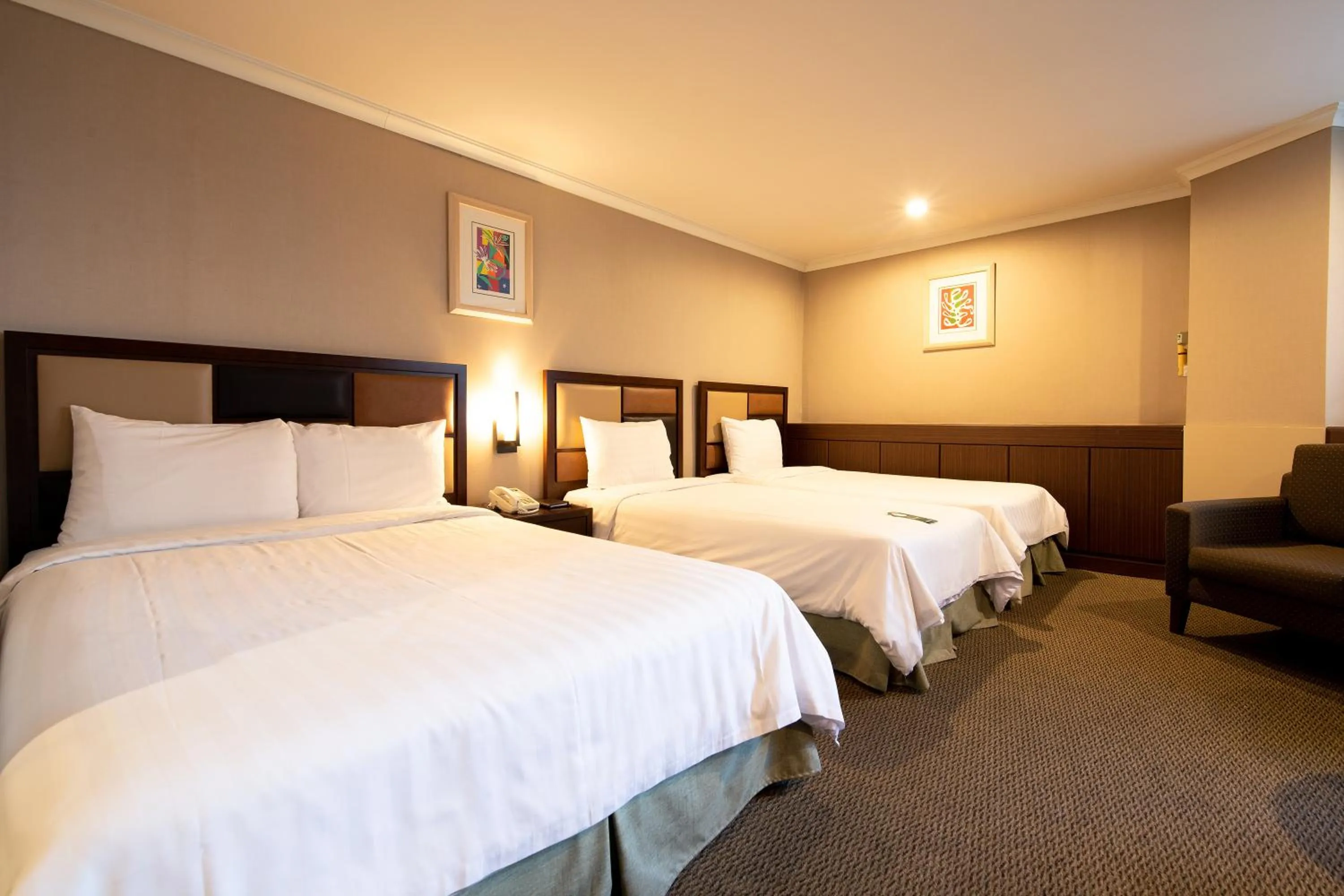 Bed in New Seoul Hotel Myeongdong