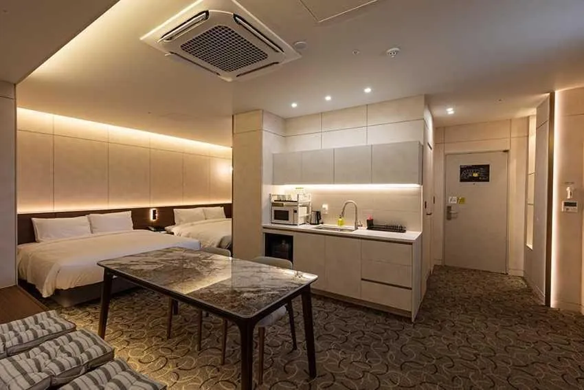 Bed in New Seoul Hotel Myeongdong