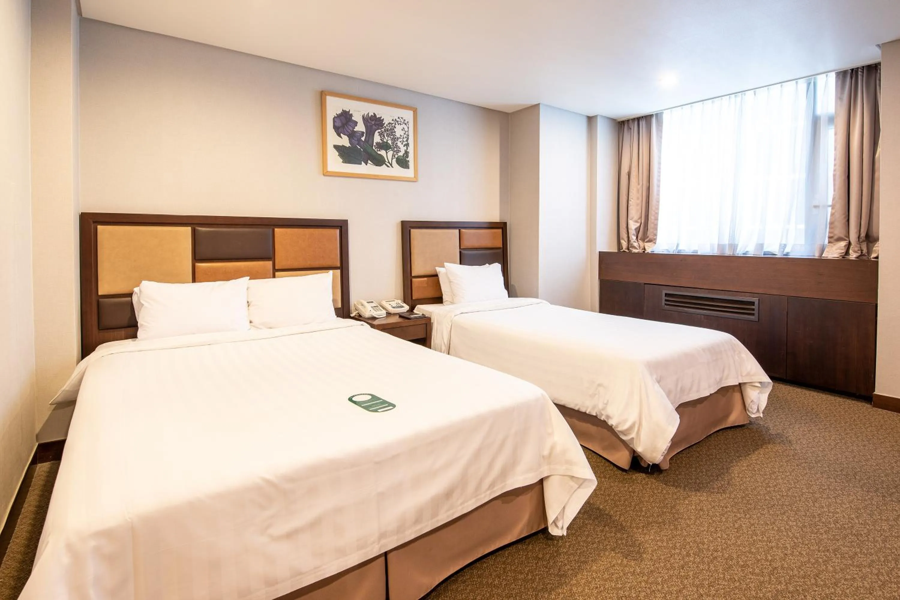 Bed in New Seoul Hotel Myeongdong