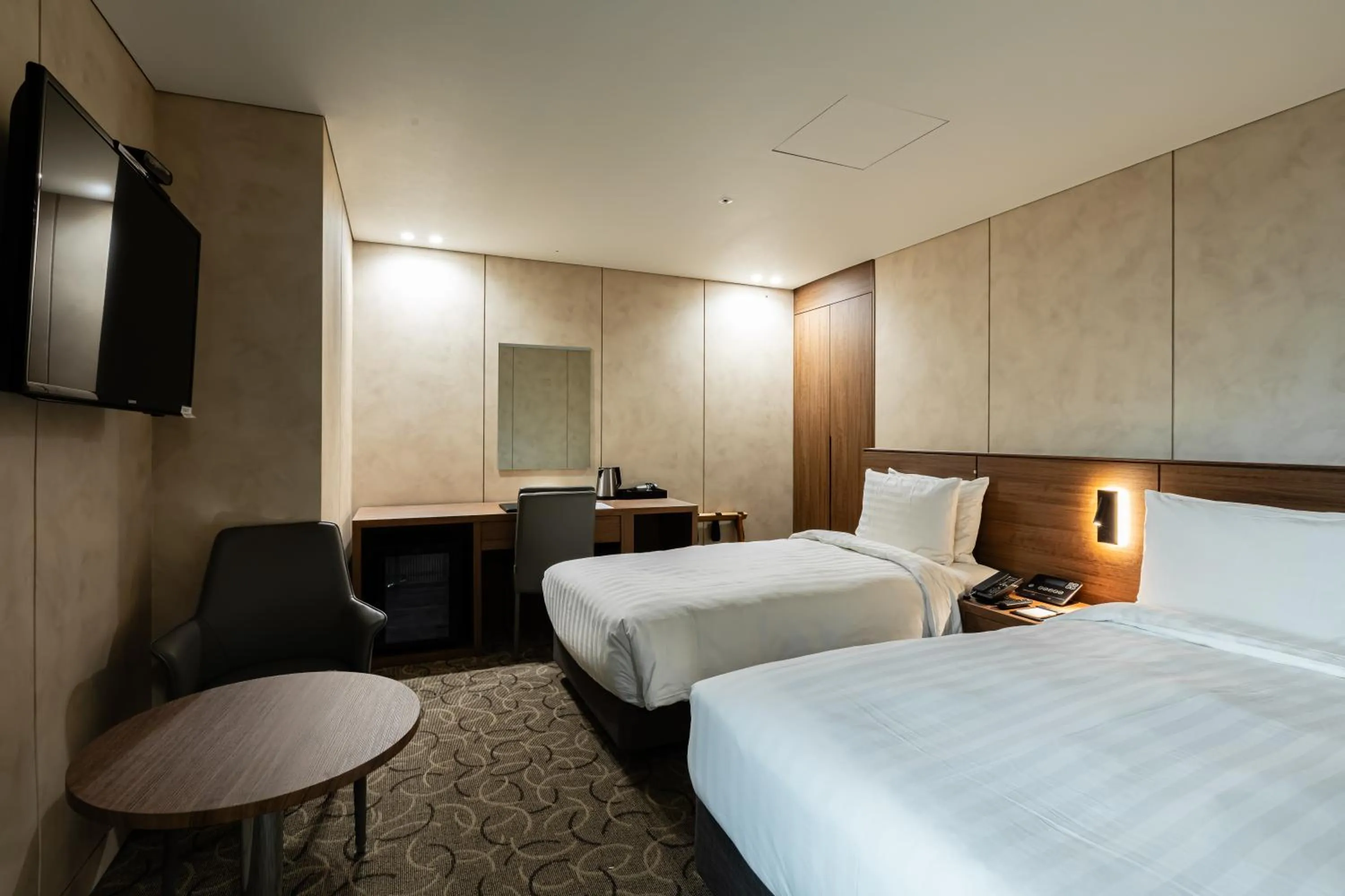Bed in New Seoul Hotel Myeongdong