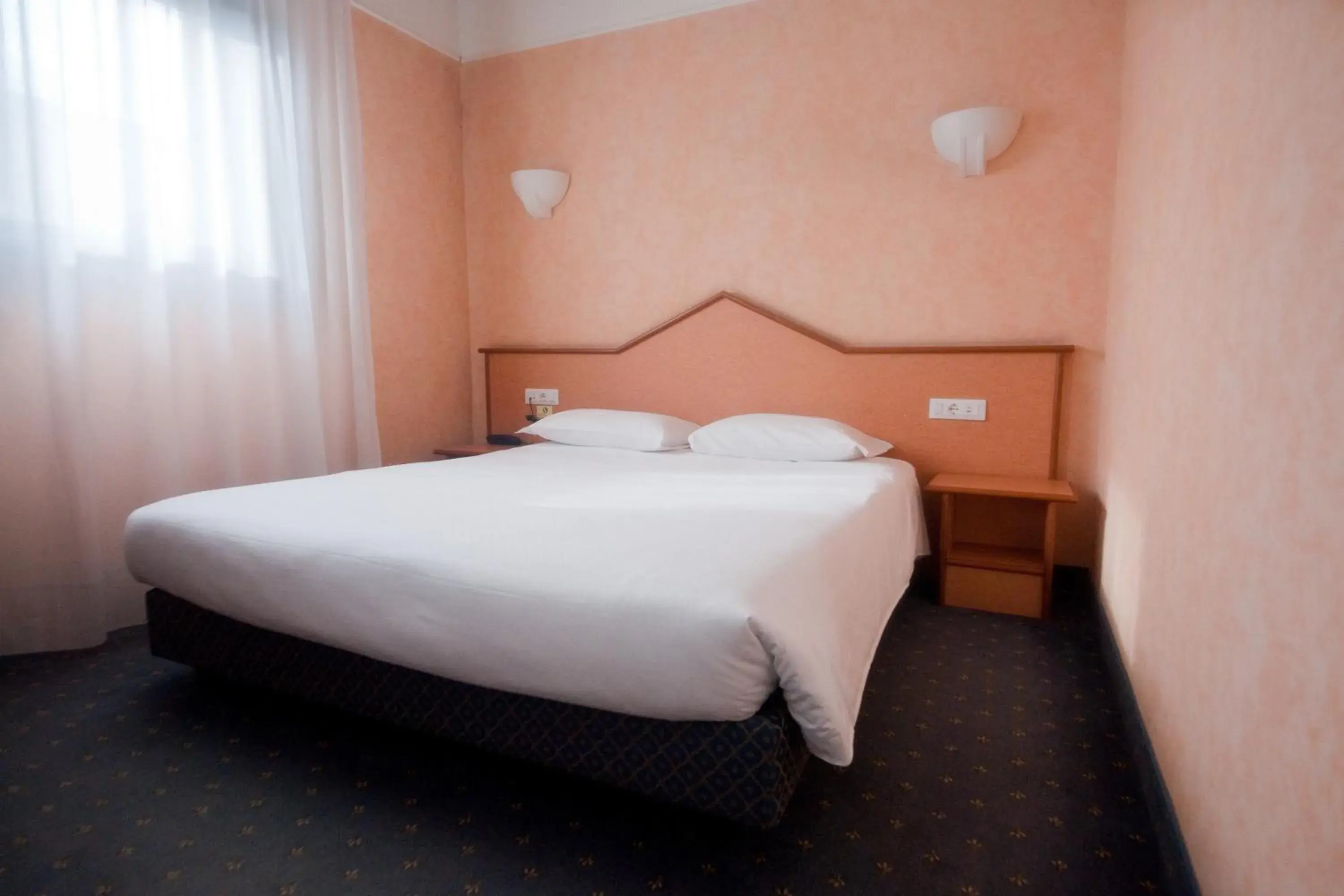 Bed in Hotel Le Sorgenti Bed in Hotel Le Sorgenti