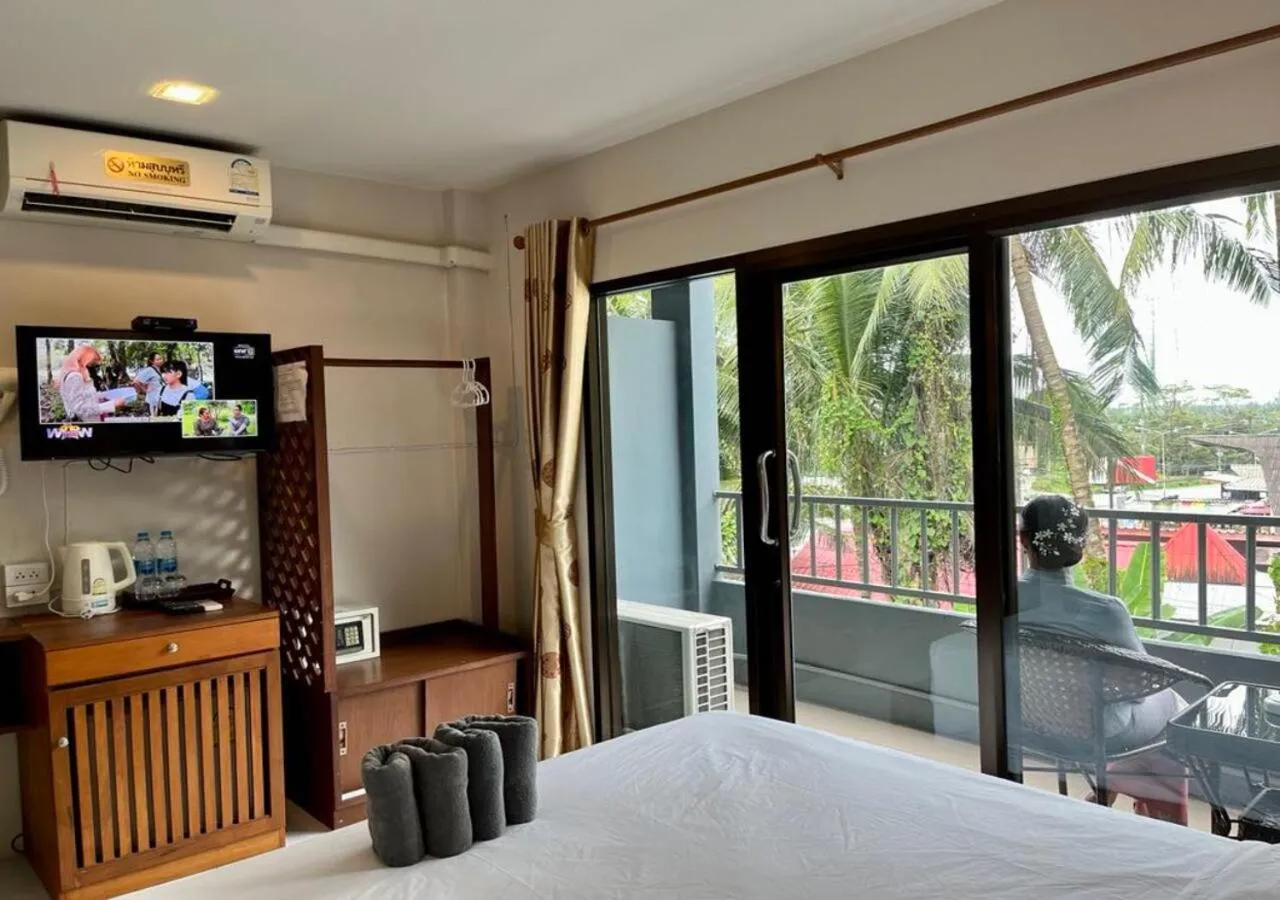 Bed in Srichada Hotel Khaolak - SHA Extra Plus