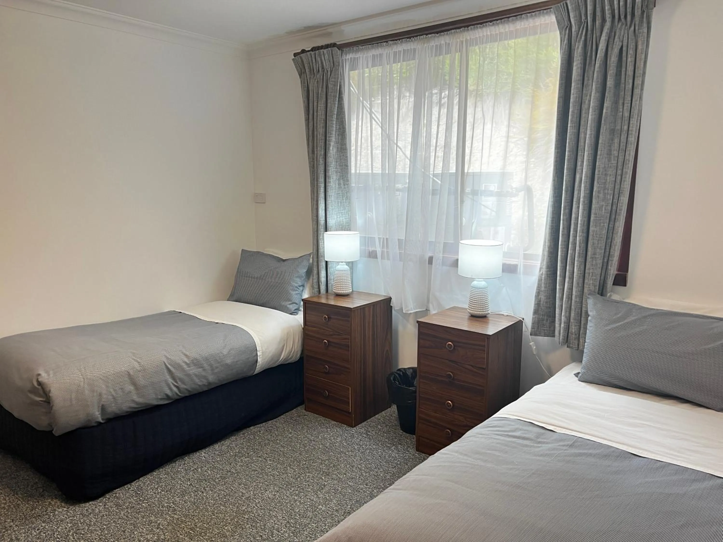 Bed in Regatta Point Tavern & Holiday Villas