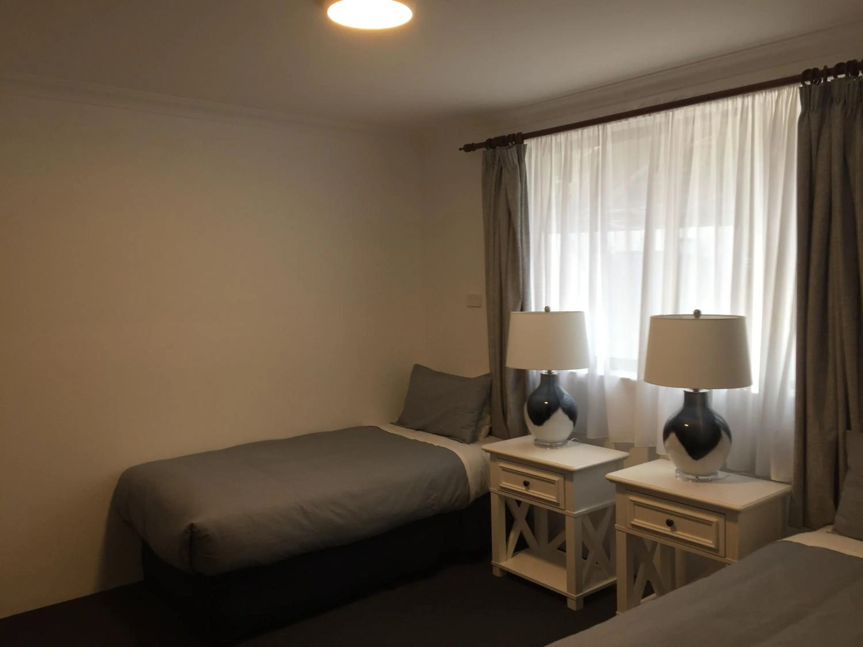 Bed in Regatta Point Tavern & Holiday Villas