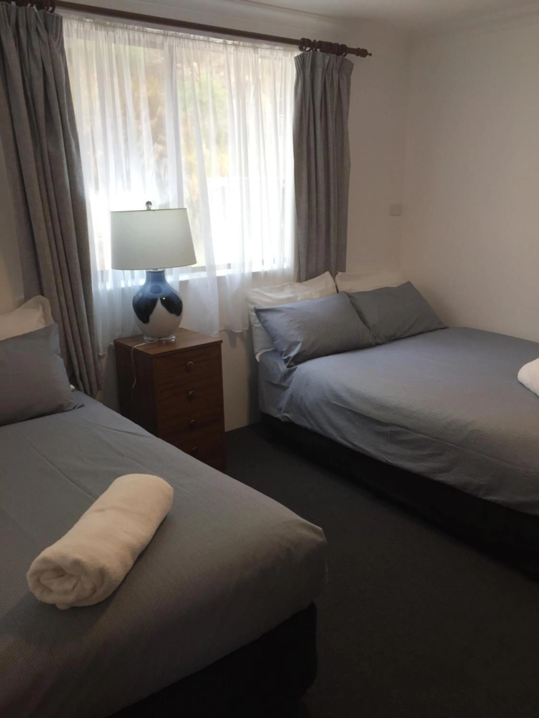 Bed in Regatta Point Tavern & Holiday Villas