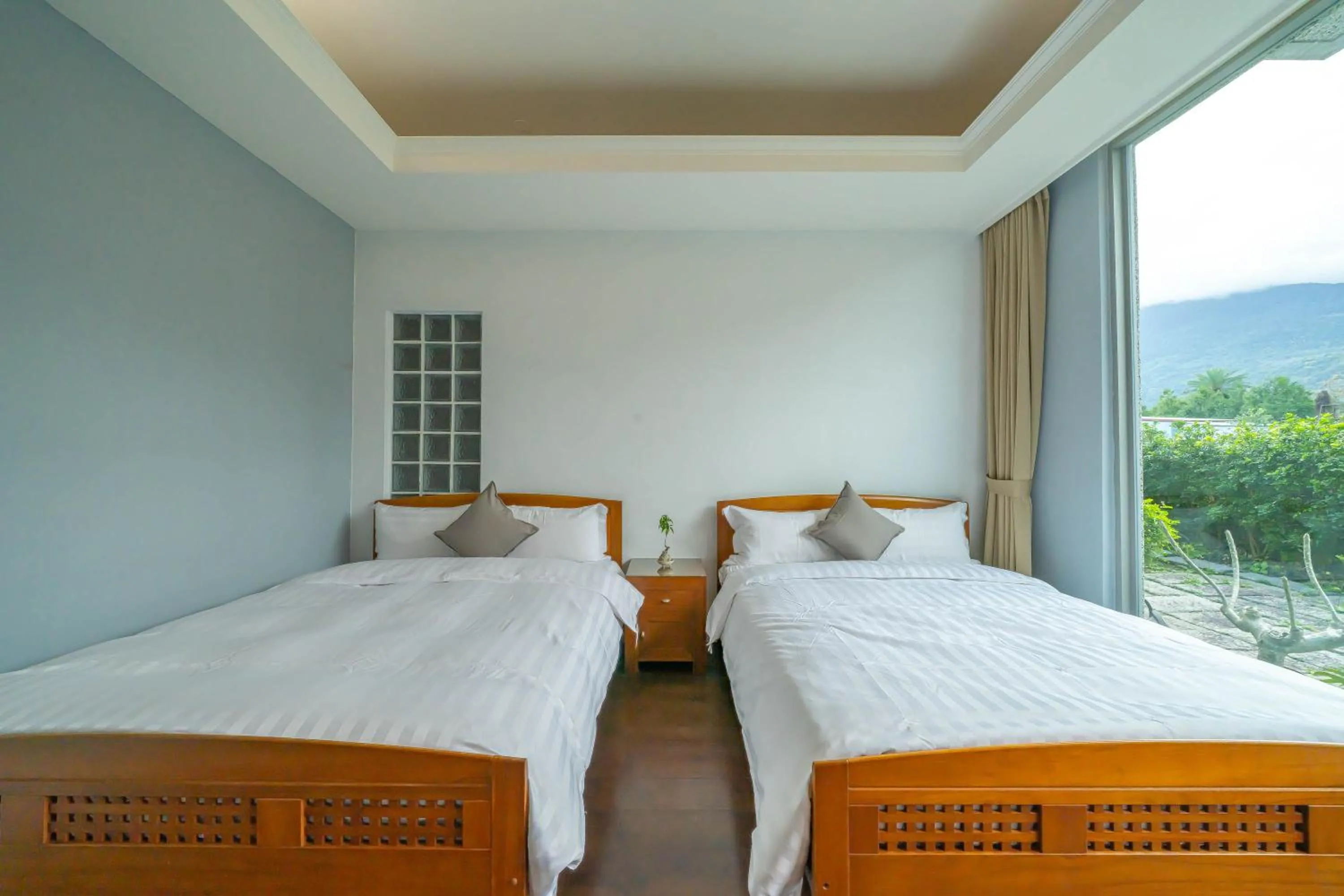 Bed in 美麗晨曦民宿-附停車位 近慈濟