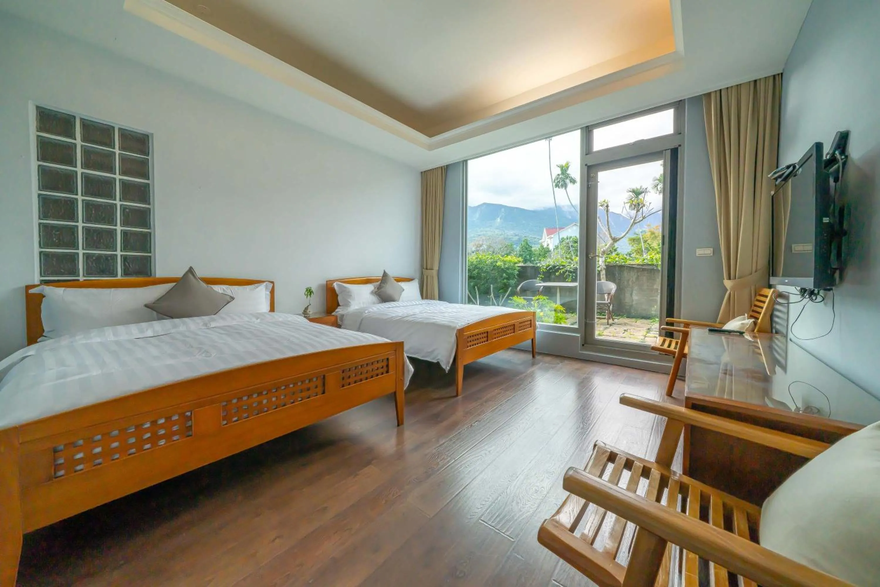 Bed in 美麗晨曦民宿-附停車位 近慈濟