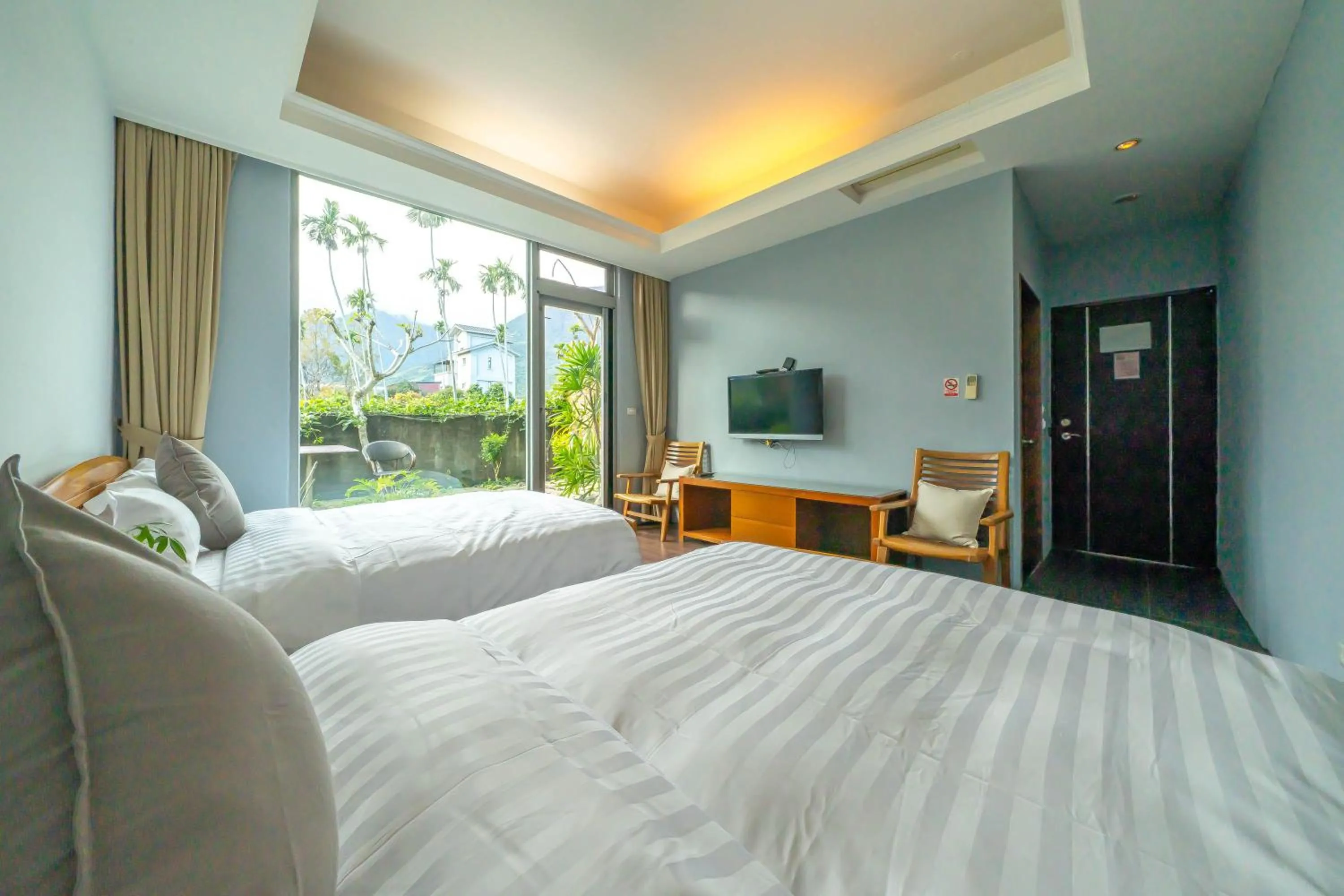 Bed in 美麗晨曦民宿-附停車位 近慈濟