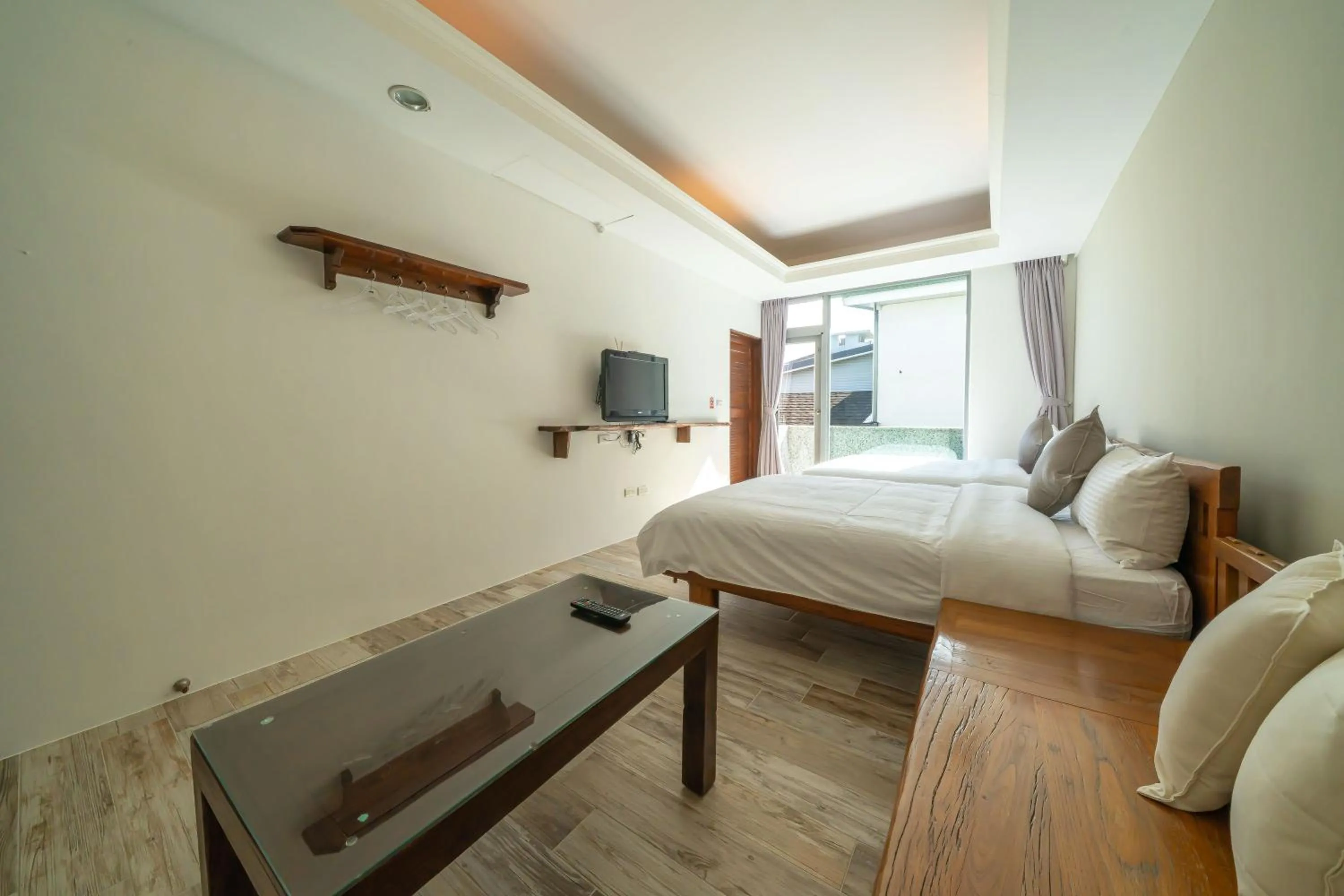 Bed in 美麗晨曦民宿-附停車位 近慈濟