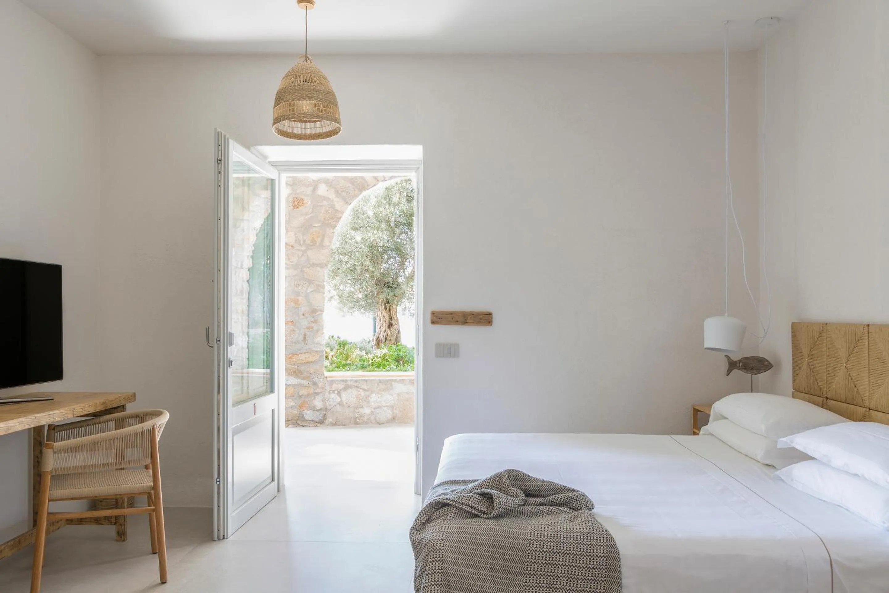 Bed in LA GUARDIA Hotel