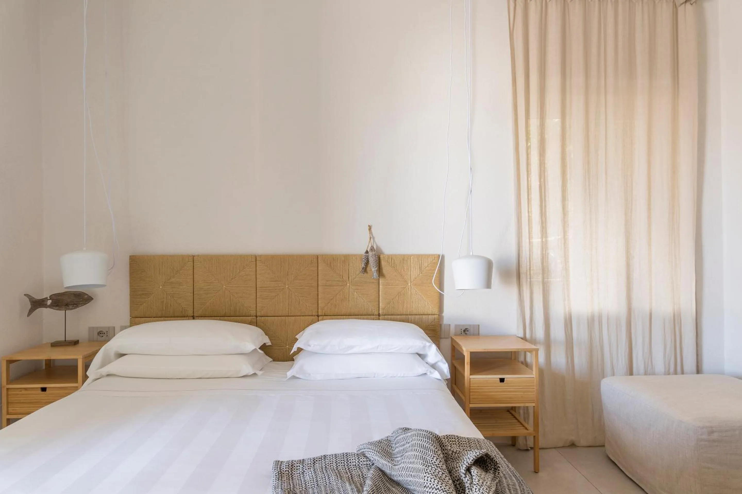 Bed in LA GUARDIA Hotel