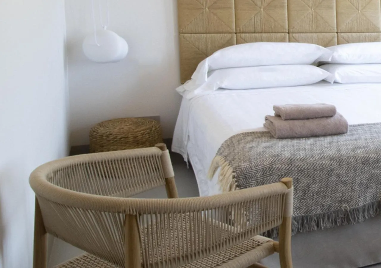 Bed in LA GUARDIA Hotel