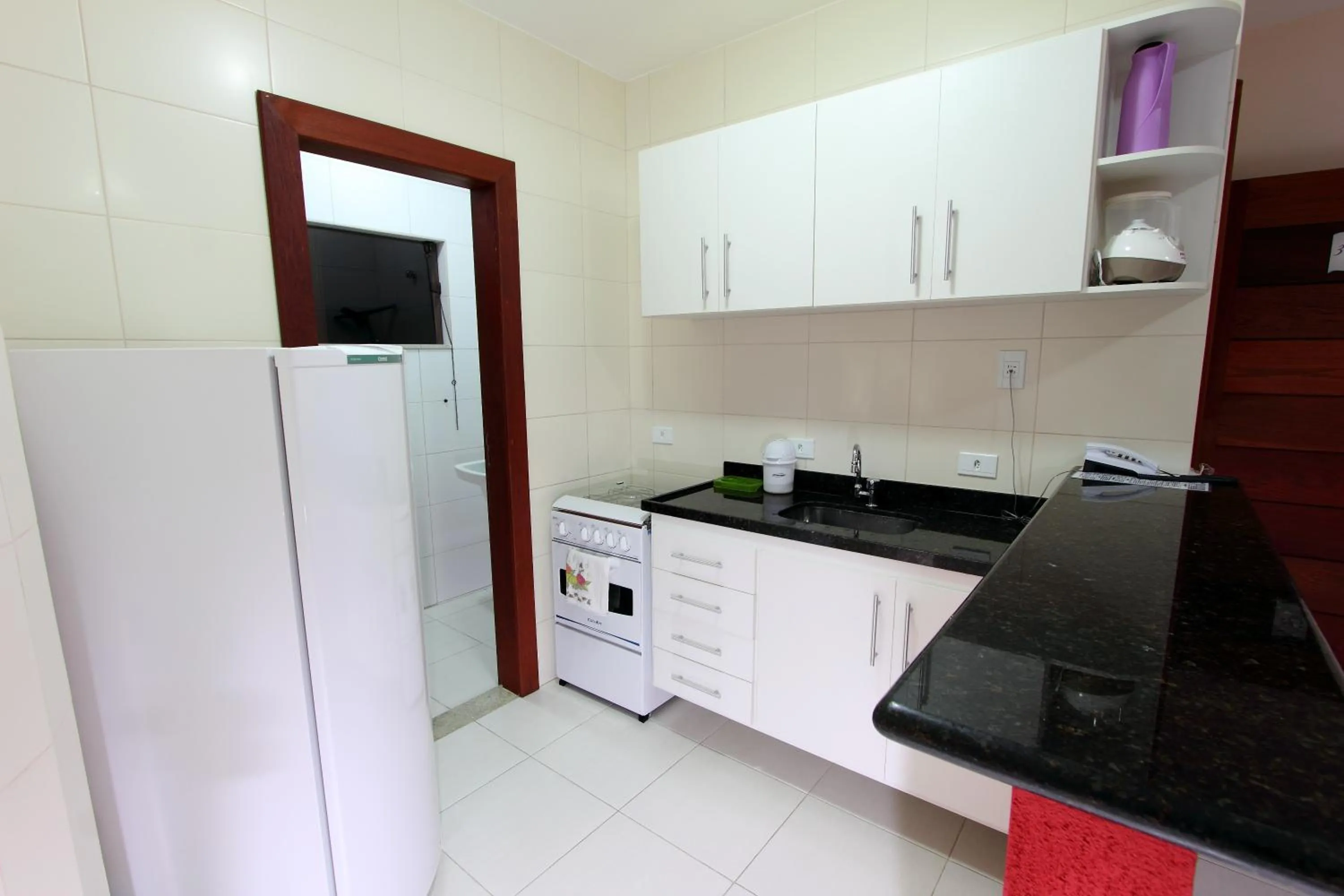 Kitchen or kitchenette in Aquaville Apart Hotel