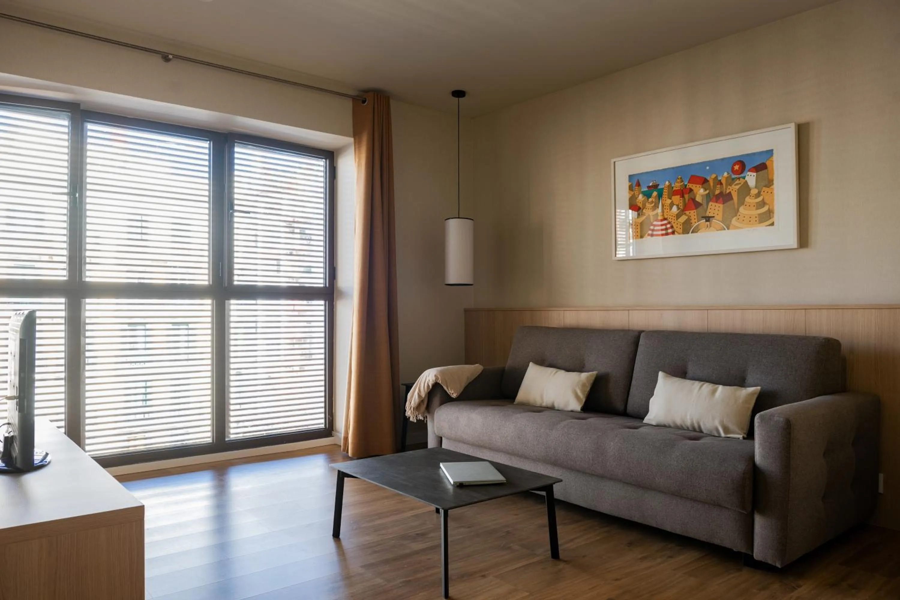 Living room in MH Apartments Urban